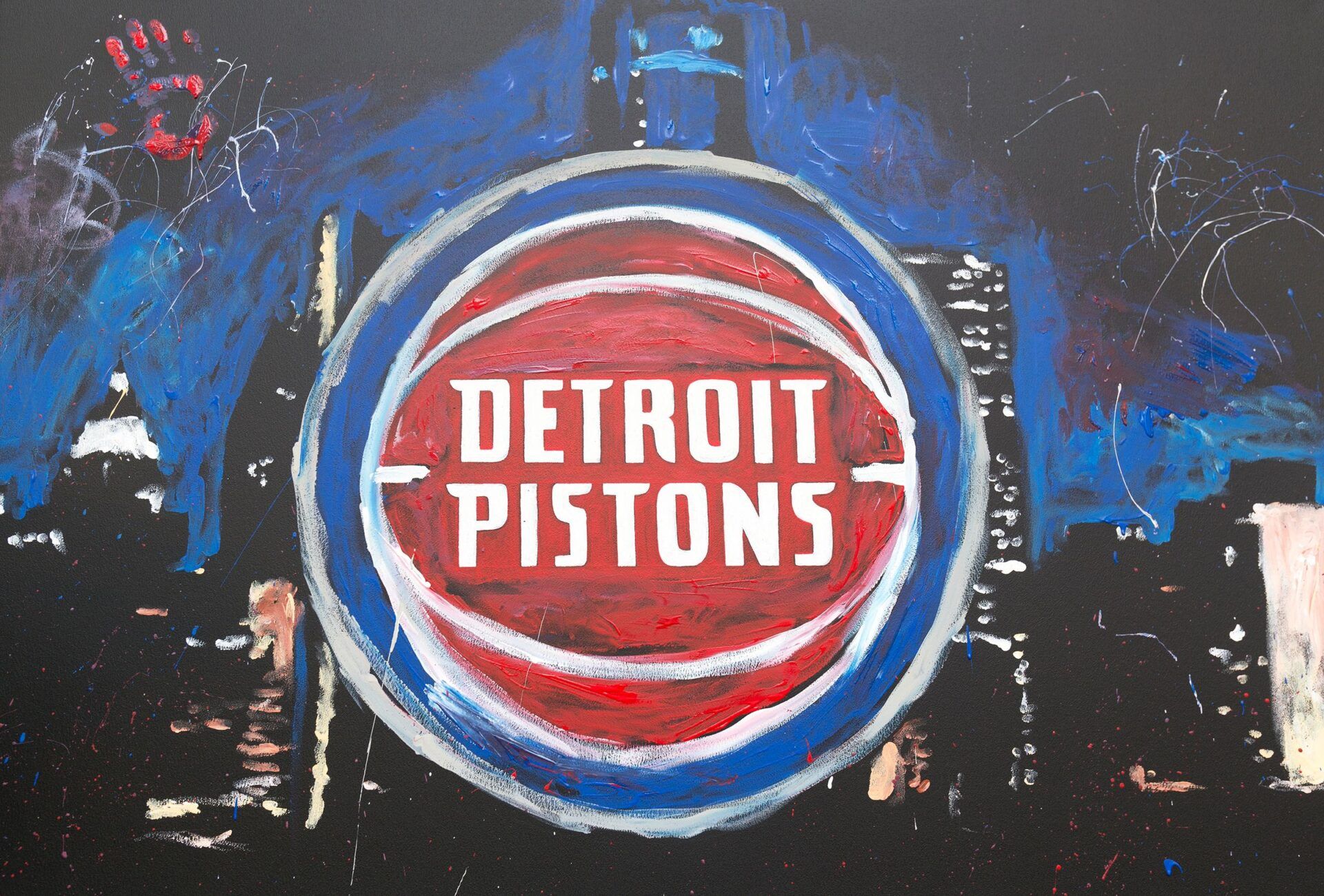 Speed finger painter, Jarred Emerson, unveils the new Detroit Pistons logo on Tuesday, May 16, 2017 at Campus Martius Park in Detroit.

Pistons Ec077