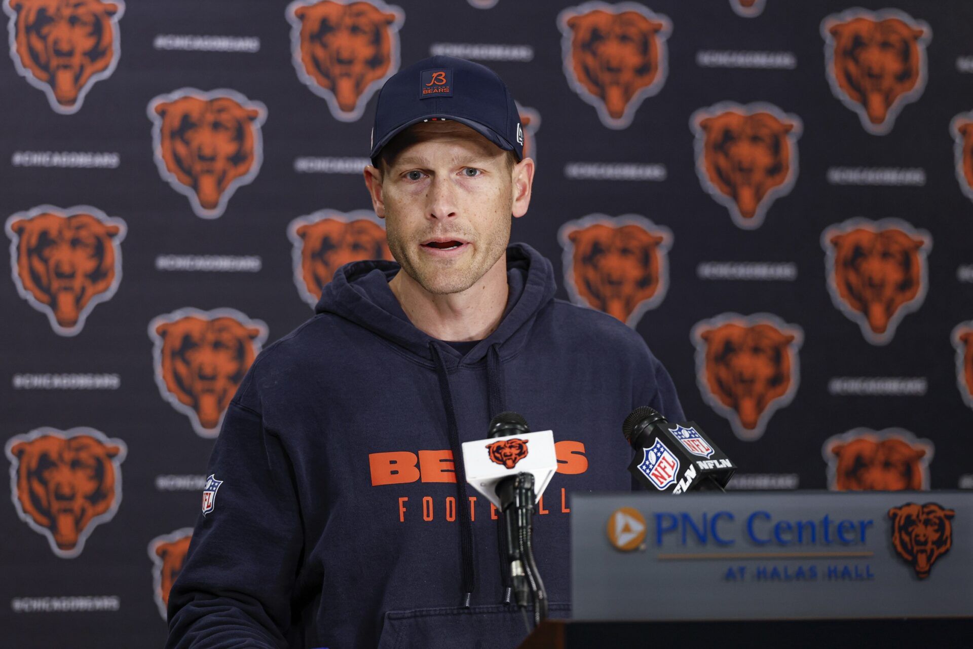 Chicago Bears head coach Ben Johnson (R) speaks during the Rookie Minicamp at Halas Hall.