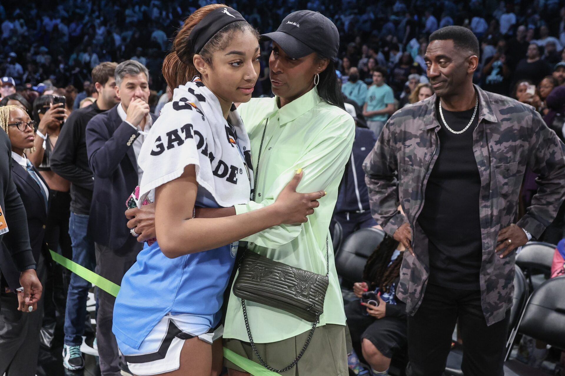 Chicago Sky forward Angel Reese (5) talks with former professional basketball player Lisa Leslie following the game against the New York Liberty at Barclays Center.