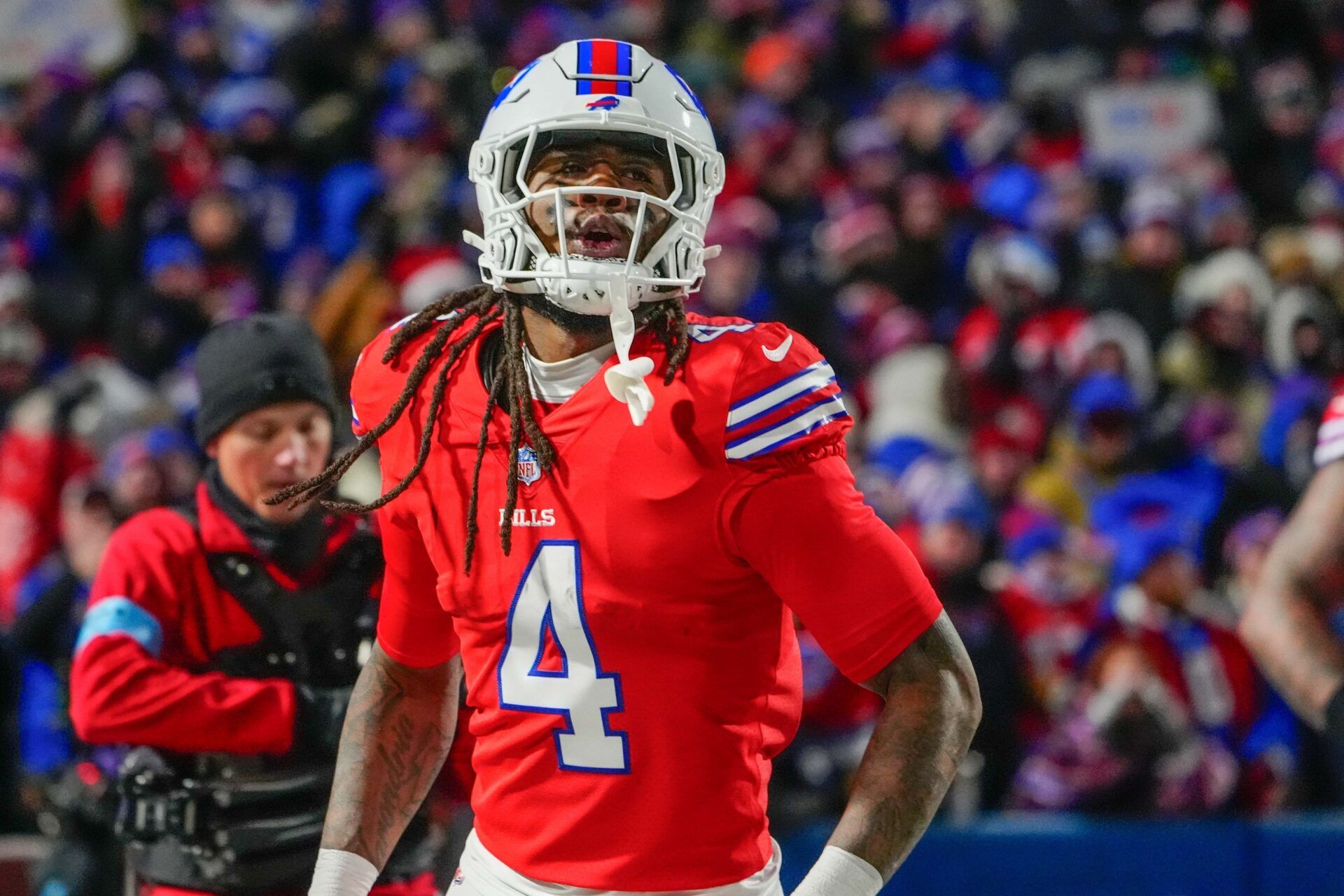 Buffalo Bills running back James Cook (4) reacts to scoring a touchdown against the New England Patriots during the first half at Highmark Stadium.