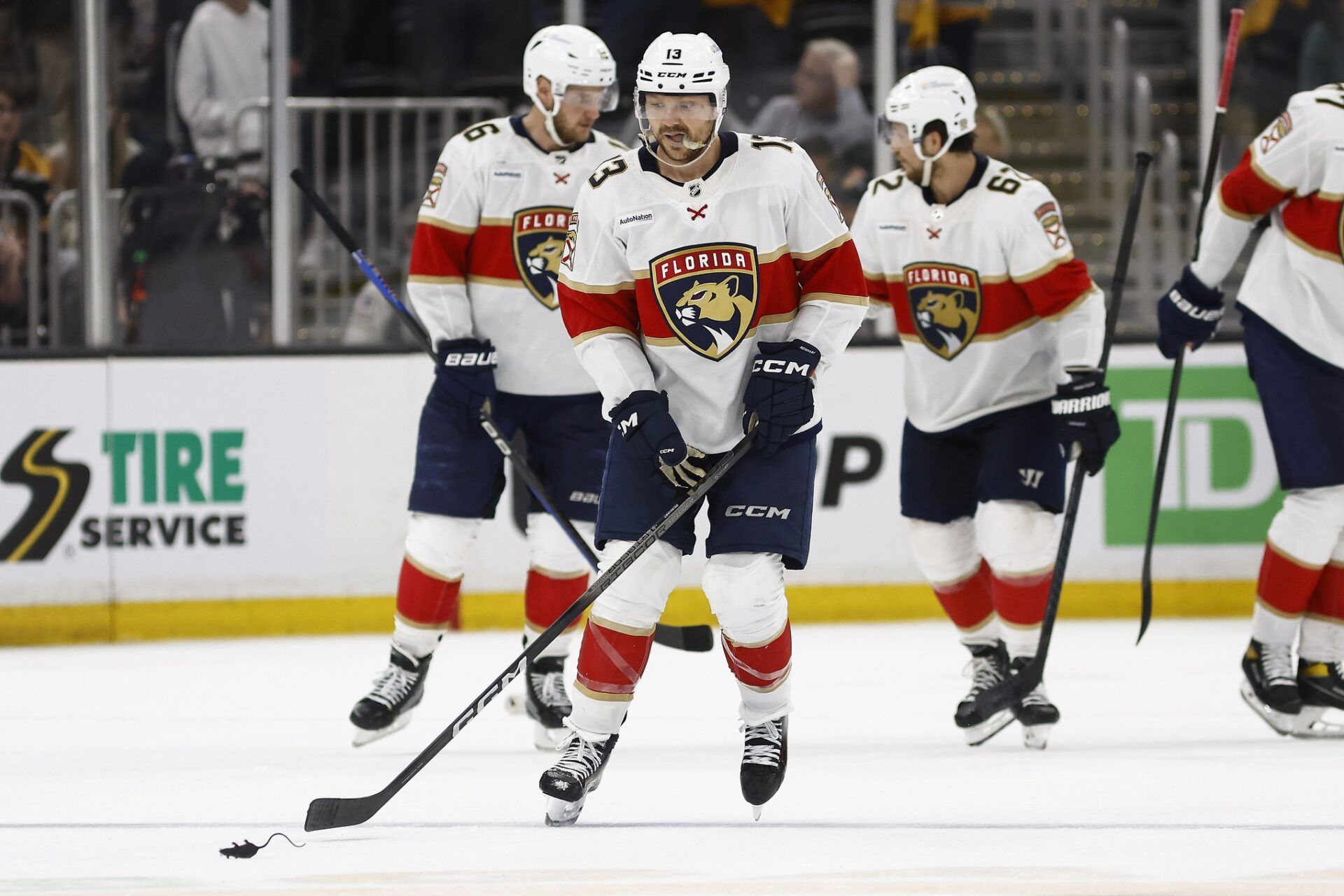 Florida Panthers center Sam Reinhart (13) goes to collect a rat after scoring against the Boston Bruins during the third period of game three of the second round of the 2024 Stanley Cup Playoffs at TD Garden.