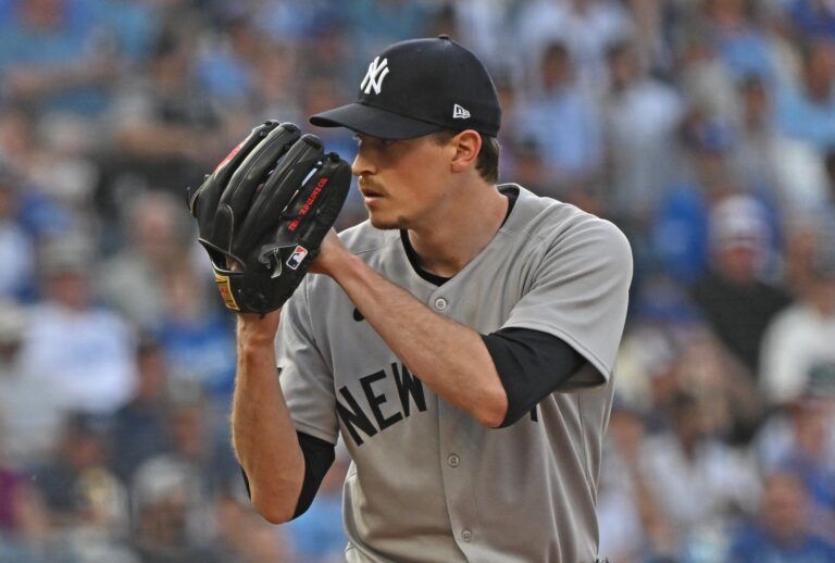 New York Yankees starting pitcher Max Fried (54) looks into home plate before throwing a pitch in the first inning against the Kansas City Royals at Kauffman Stadium.