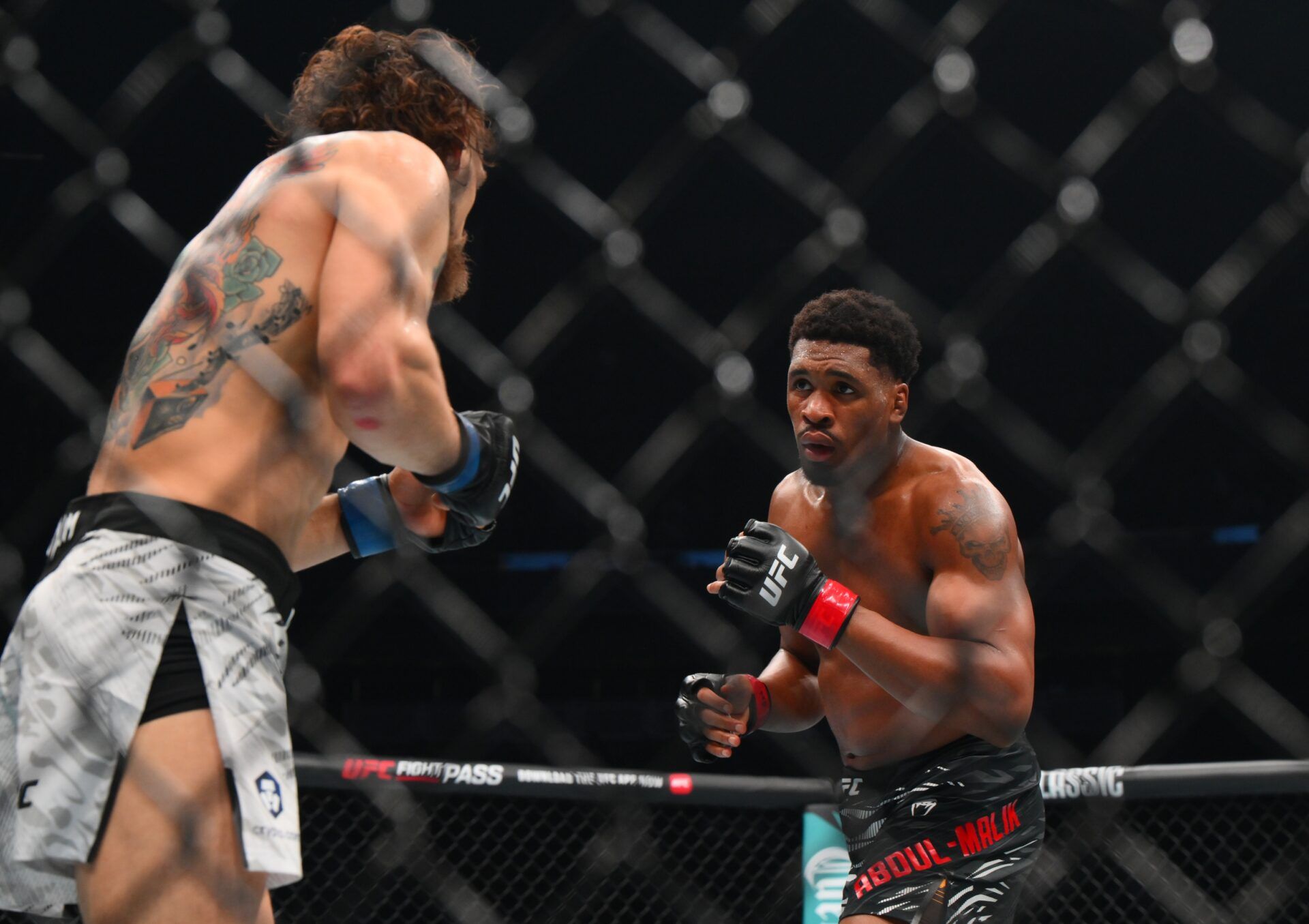 Mansur Abdul-Malik (red gloves) fights Nick Klein (blue gloves) in the middleweight bout during UFC Fight Night at Climate Pledge Arena.