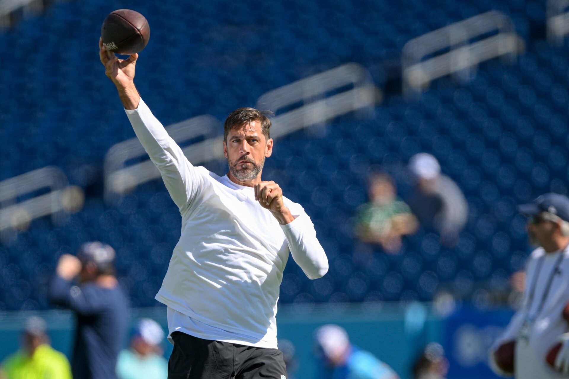 New York Jets quarterback Aaron Rodgers (8) throws during pregame warmups against the Tennessee Titans at Nissan Stadium.