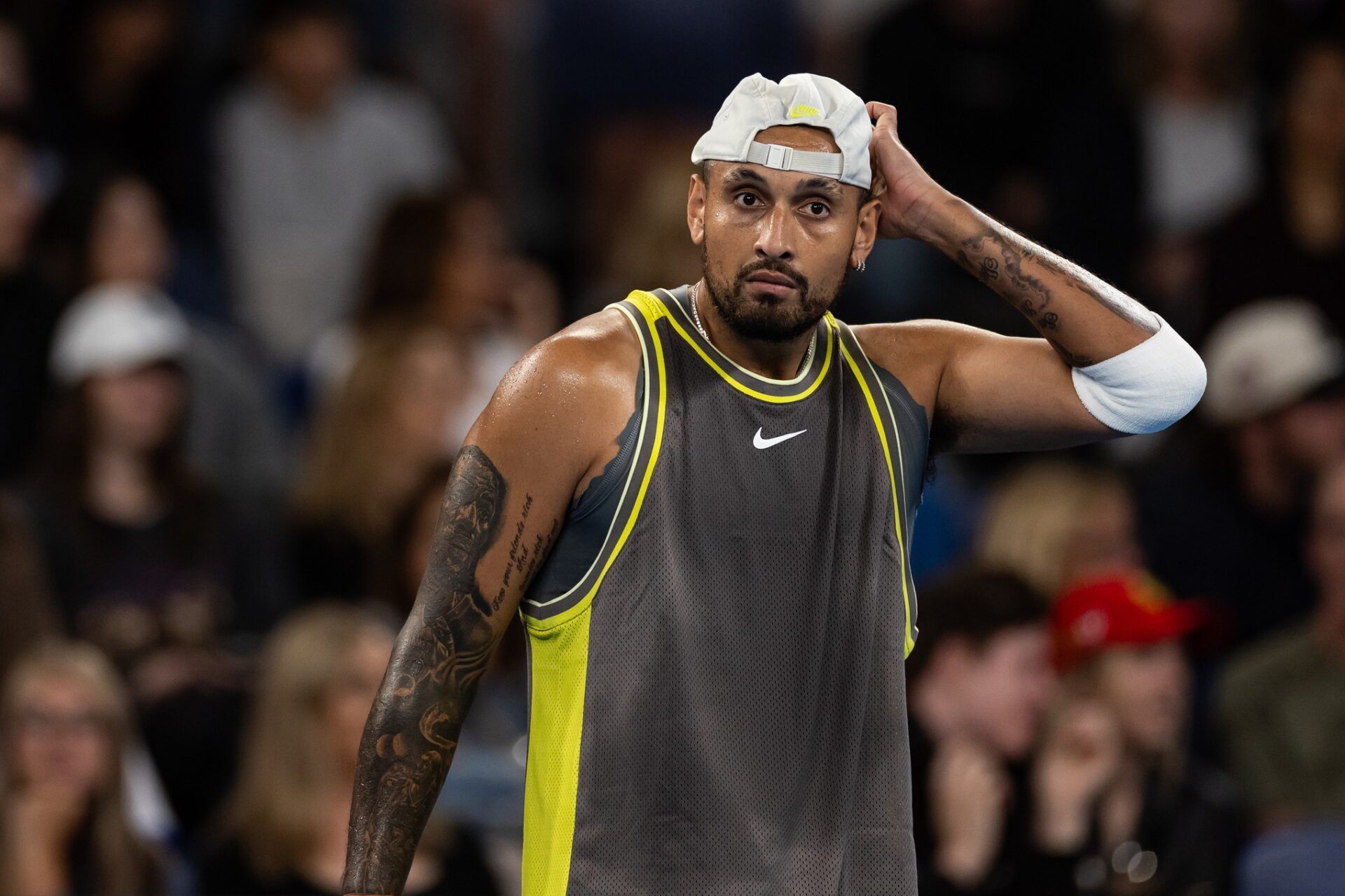 Nick Kyrgios of Australia during his match against James Duckworth of Australia and Aleksandar Vukic of Australia in the first round of the men's doubles at the 2025 Australian Open at Melbourne Park.