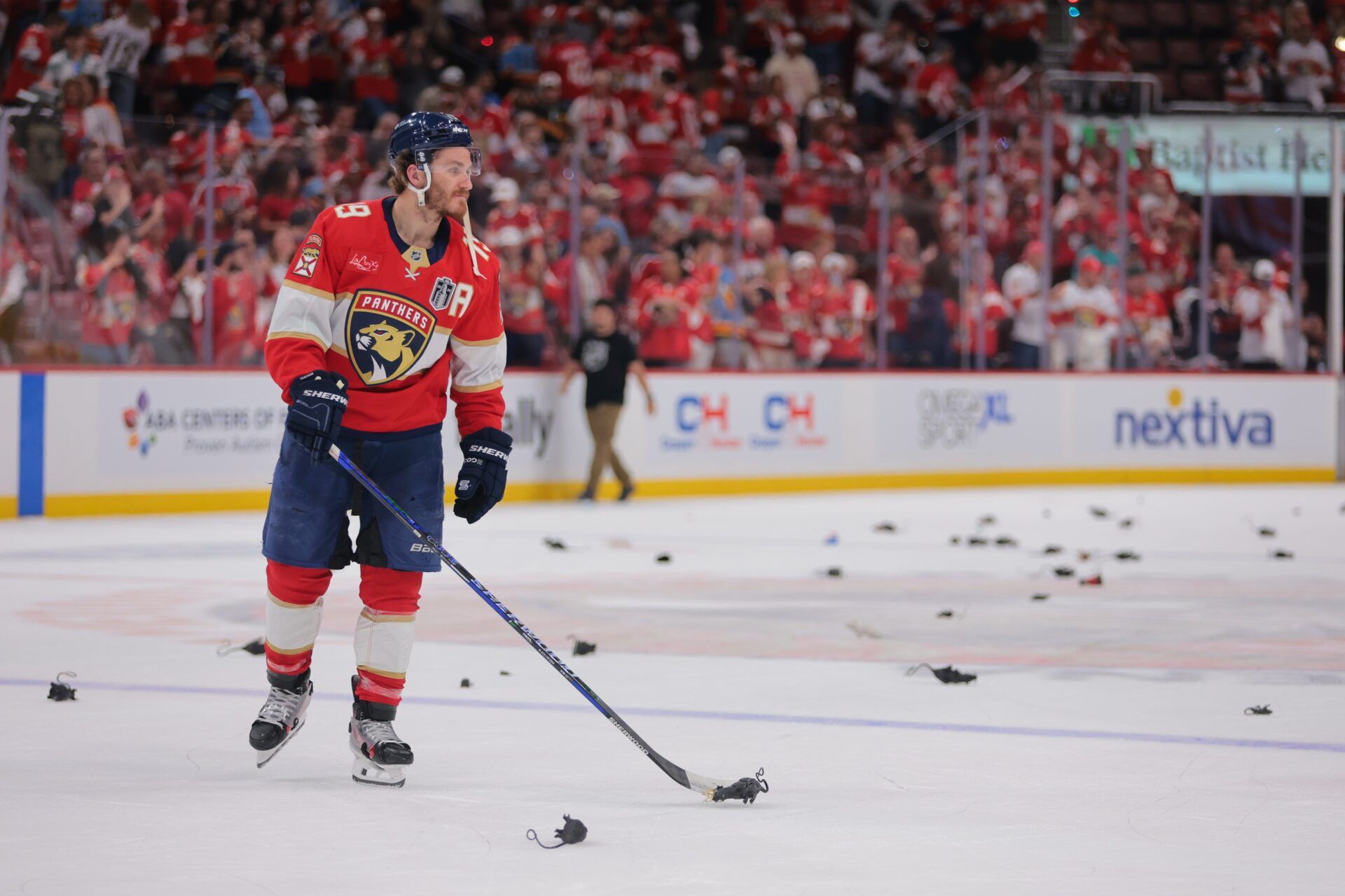 Florida Panthers forward Matthew Tkachuk (19) puts a rat on the stick after the third period against the Edmonton Oilers in game three of the 2025 Stanley Cup Final at Amerant Bank Arena.