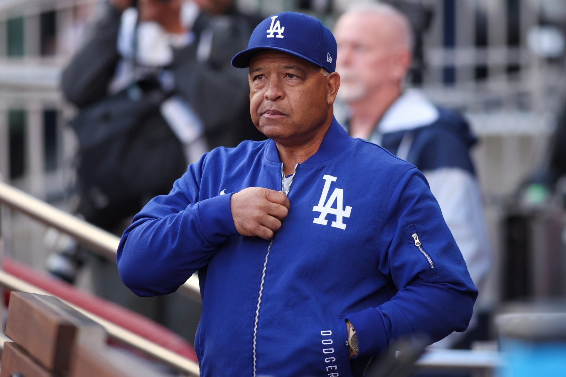 Los Angeles Dodgers manager Dave Roberts (30) in the dugout before a game against the Atlanta Braves at Truist Park.