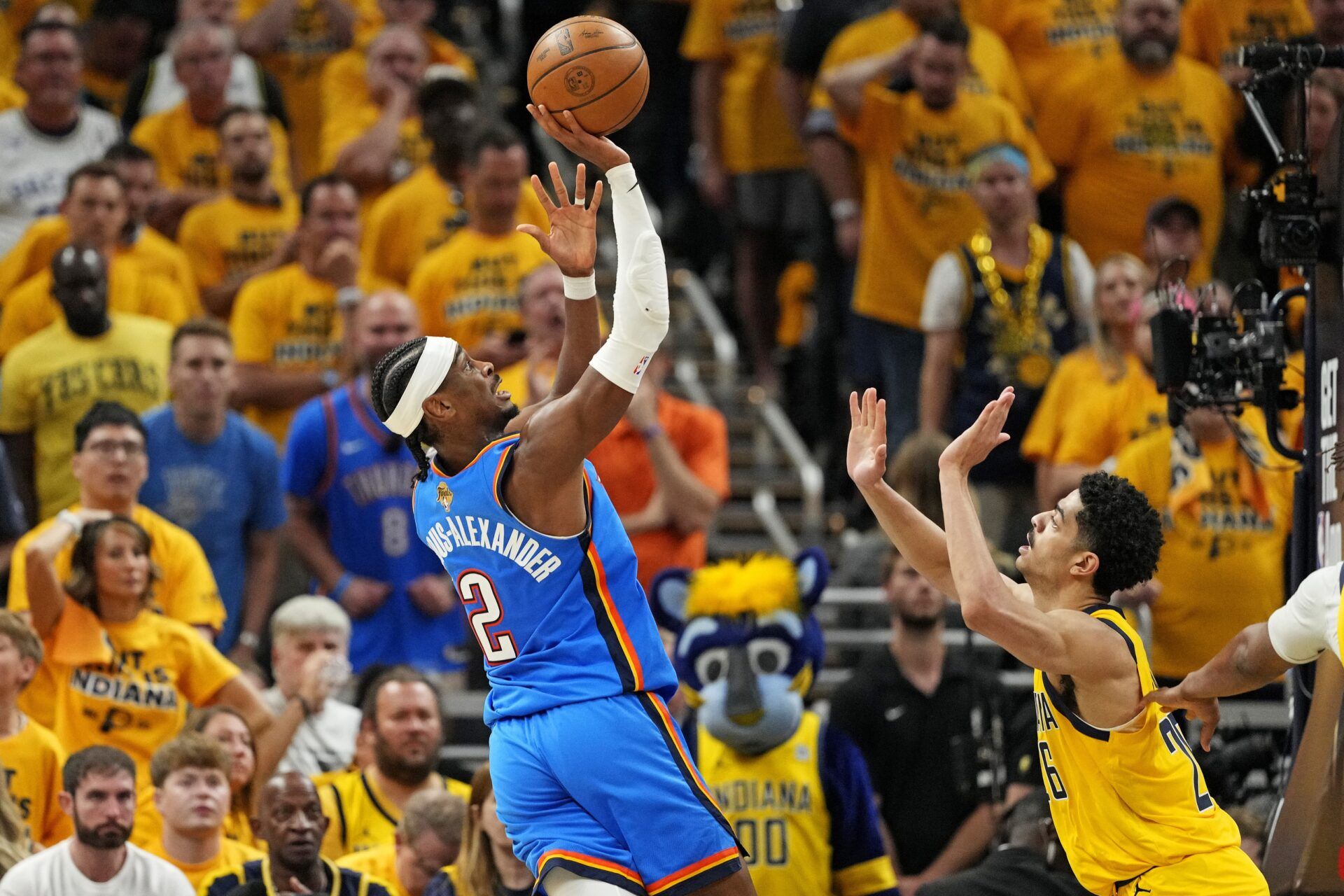 Oklahoma City Thunder guard Shai Gilgeous-Alexander (2) shoots the ball against Indiana Pacers guard Ben Sheppard (26) during the third quarter in game three of the 2025 NBA Finals at Gainbridge Fieldhouse.