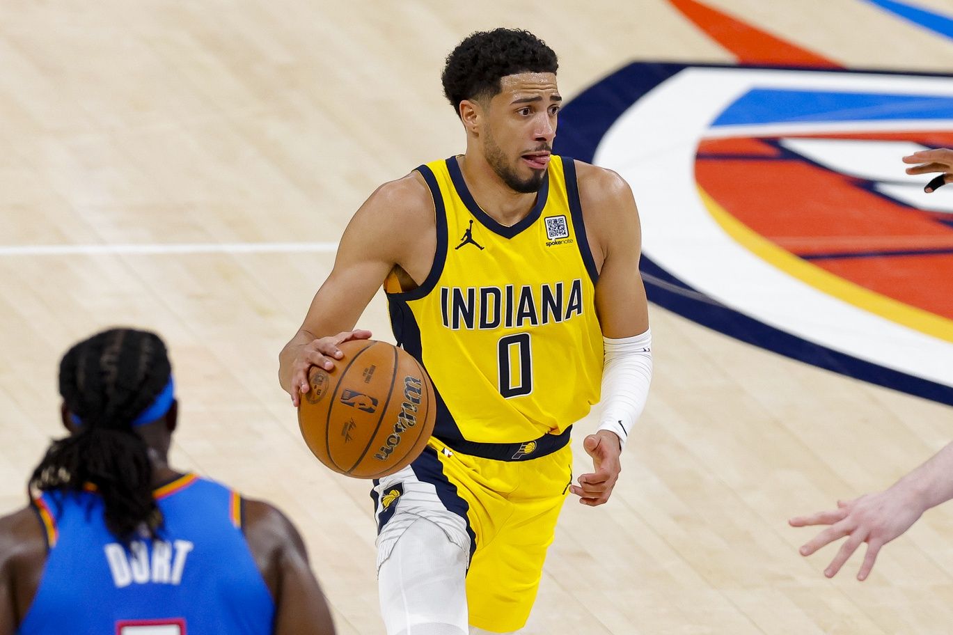 Indiana Pacers guard Tyrese Haliburton (0) brings the ball up court against the Oklahoma City Thunder during the third quarter of game two of the 2025 NBA Finals at Paycom Center.