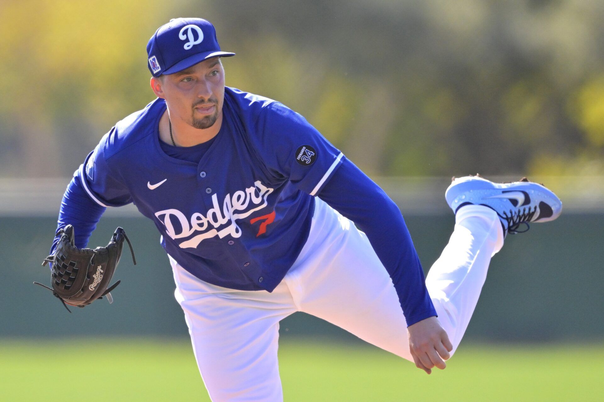 Los Angeles Dodgers starting pitcher Blake Snell (7) throws live batting practice during spring training workouts at Camelback Ranch.