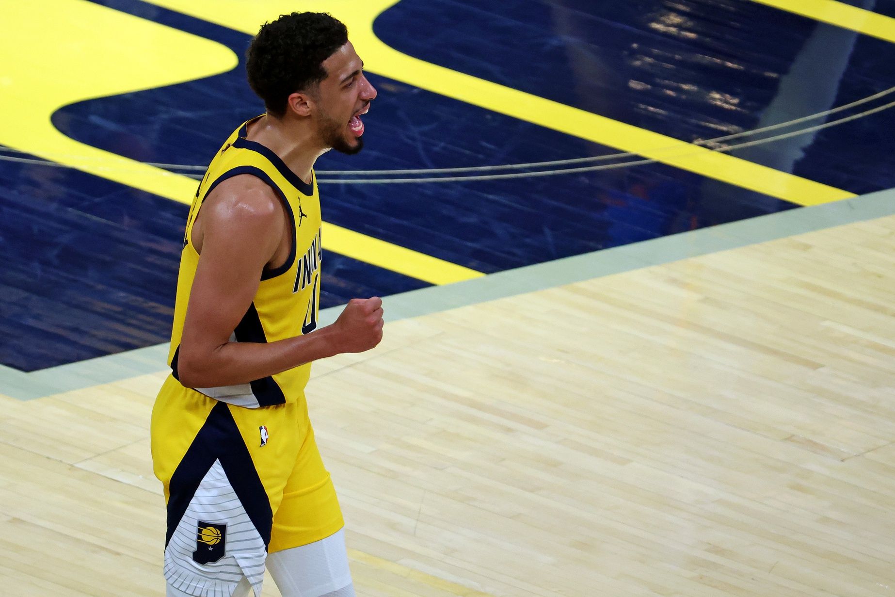 Indiana Pacers guard Tyrese Haliburton (0) celebrates after beating the Oklahoma City Thunder in game three of the 2025 NBA Finals at Gainbridge Fieldhouse.
