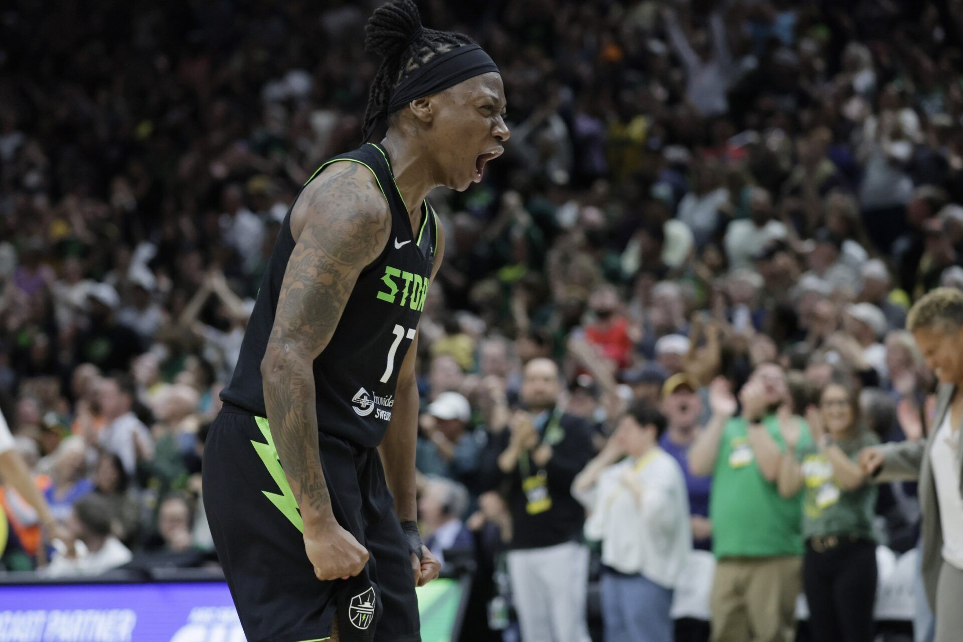 Seattle Storm guard Erica Wheeler (17) reacts after scoring against the Minnesota Lynx during the second half at Climate Pledge Arena.