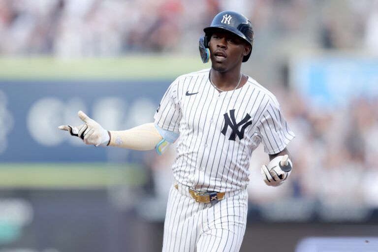 New York Yankees third baseman Jazz Chisholm Jr. (13) rounds the bases after hitting a three run home run against the Boston Red Sox during the first inning at Yankee Stadium.