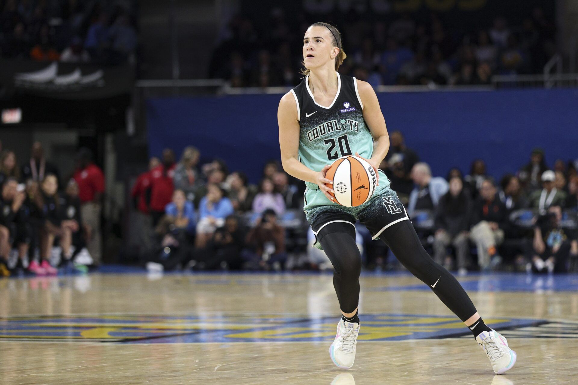 New York Liberty guard Sabrina Ionescu (20) looks to shoot against the Chicago Sky during the first half at Wintrust Arena.
