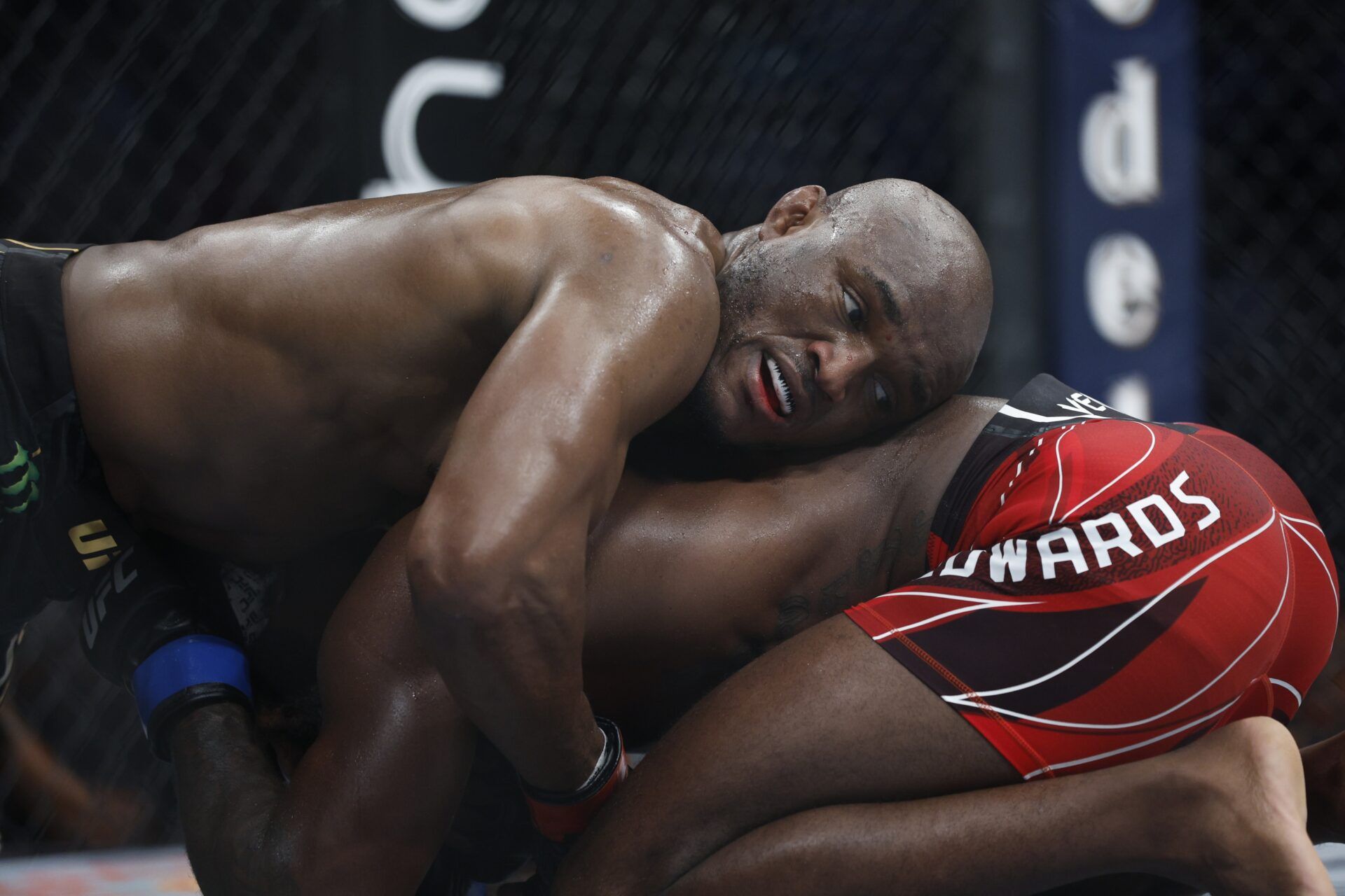 Kamaru Usman (red gloves) fights Leon Edwards (blue gloves) during UFC 278 at Vivint Arena.