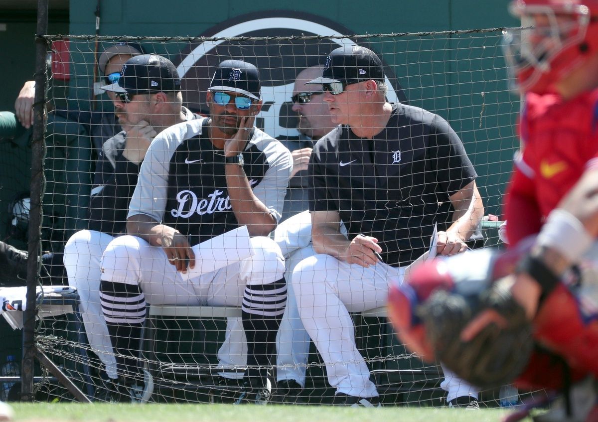 Detroit Tigers bench George Lombardi and manager AJ Hinch talk in the dugout during action against the Philadelphia Phillies at Publix Field at Joker Marchant Stadium on Friday, March 18, 2022, in Lakeland, Florida.

Tigersphil