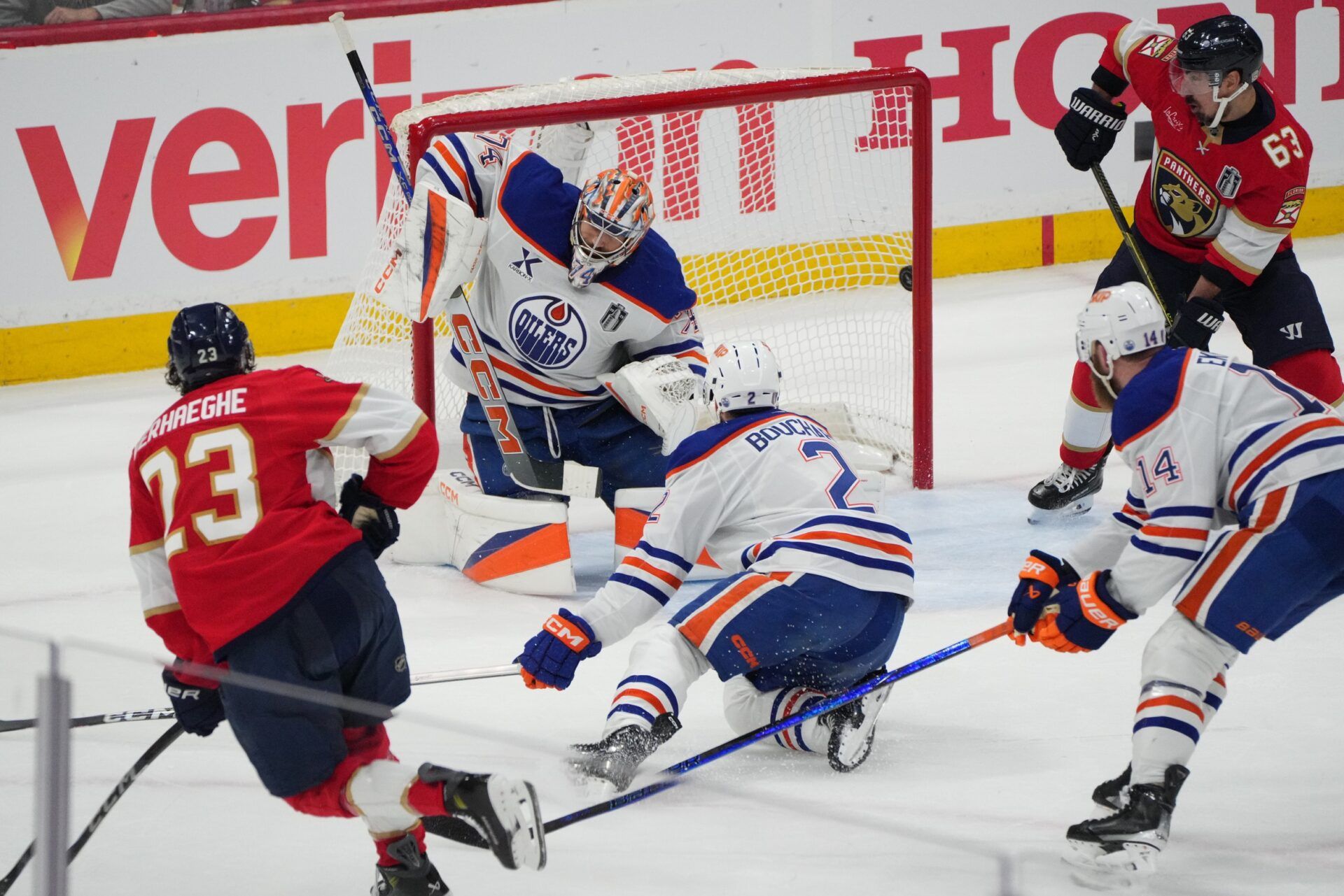 Florida Panthers forward Carter Verhaeghe (23) scores against Edmonton Oilers goaltender Stuart Skinner (74) and defenseman Evan Bouchard (2) during the first period in game three of the 2025 Stanley Cup Final at Amerant Bank Arena.