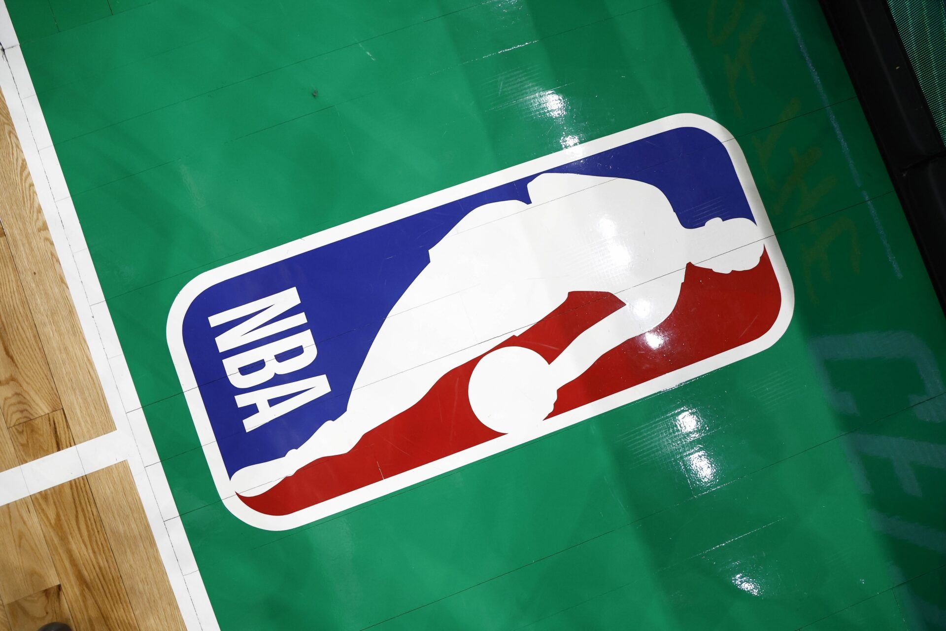 The NBA logo is seen on the court before thegame between the Boston Celtics and the Portland Trail Blazers at TD Garden.