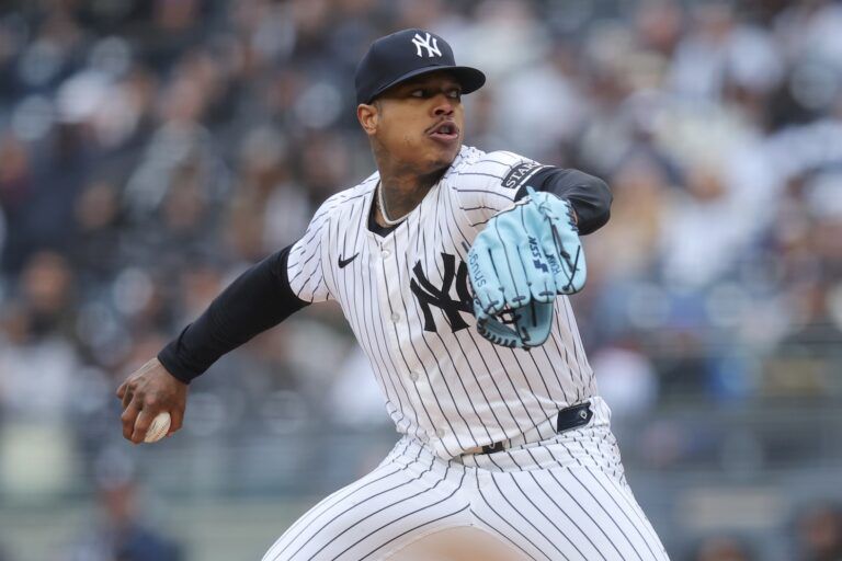 New York Yankees starting pitcher Marcus Stroman (0) pitches against the Milwaukee Brewers during the first inning at Yankee Stadium.