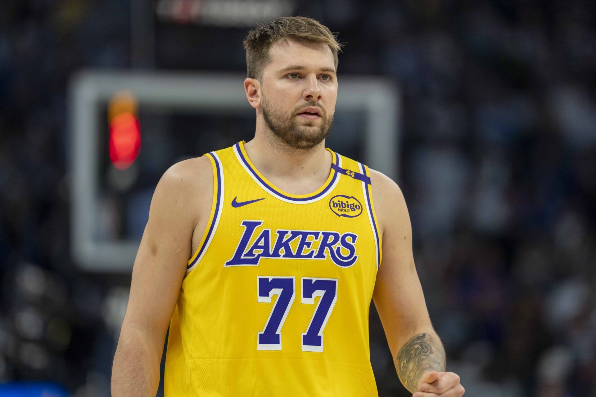 Los Angeles Lakers guard Luka Doncic (77) looks on against the Minnesota Timberwolves in the first half during game three of first round for the 2024 NBA Playoffs at Target Center.