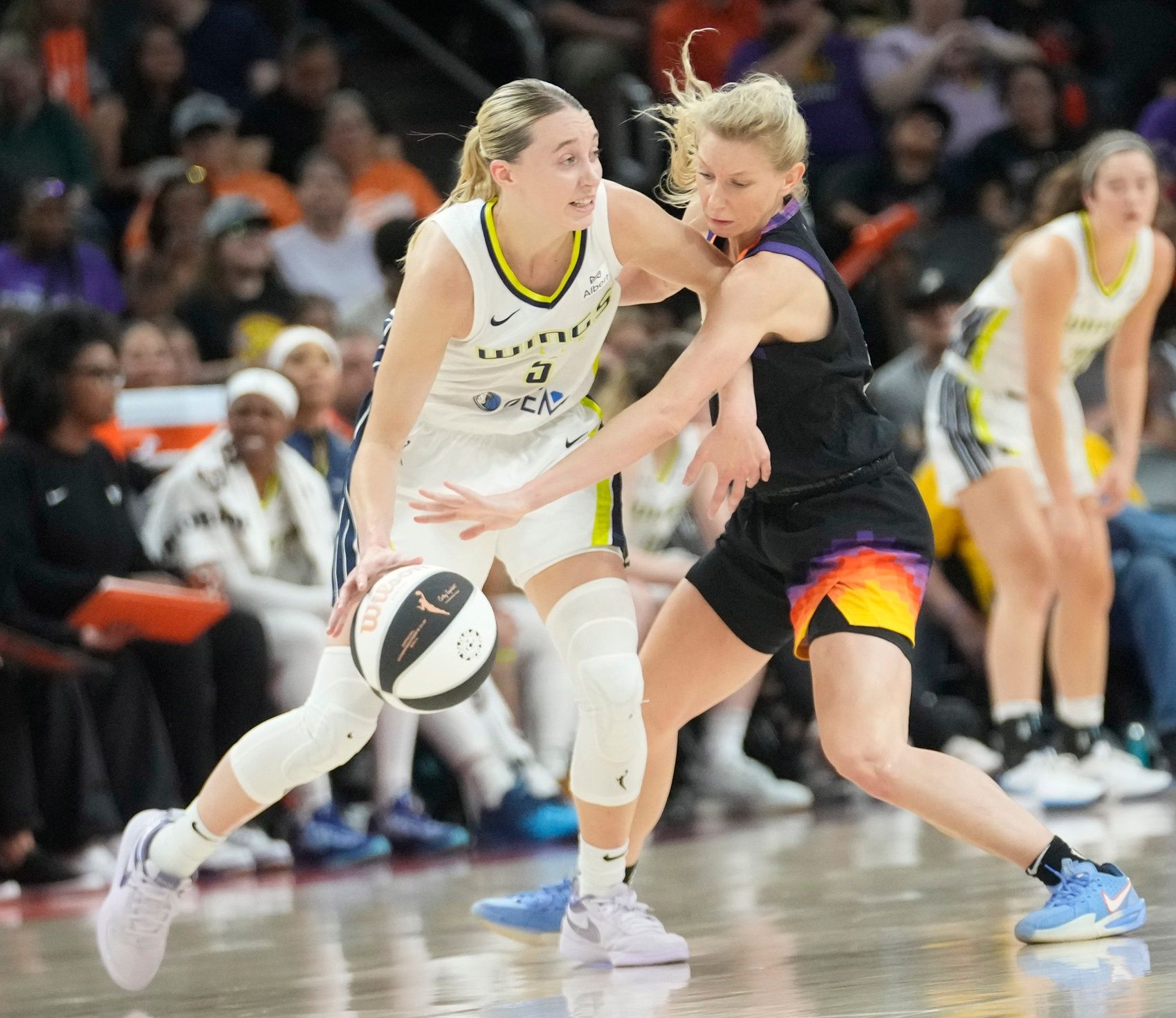 Phoenix Mercury guard Lexi Held (1) defends against Dallas Wings guard Paige Bueckers (5) during the second quarter in Phoenix, at PHX Arena on June 11, 2025.