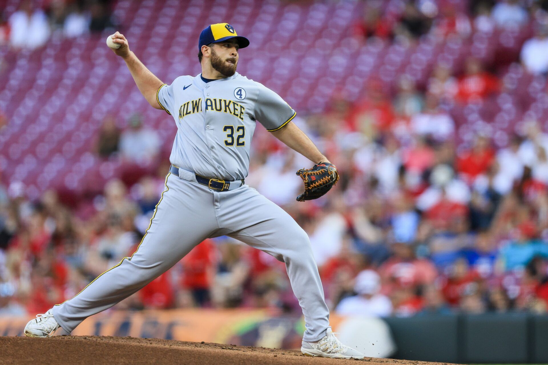 Milwaukee Brewers starting pitcher Aaron Civale (32) pitches against the Cincinnati Reds in the first inning at Great American Ball Park.