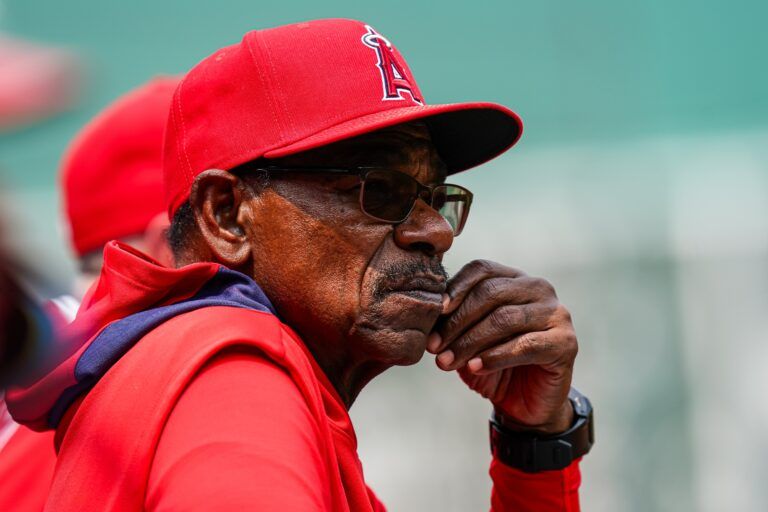 Los Angeles Angels manager Ron Washington (37) watches from the dugout against the Boston Red Sox in the first inning at Fenway Park.