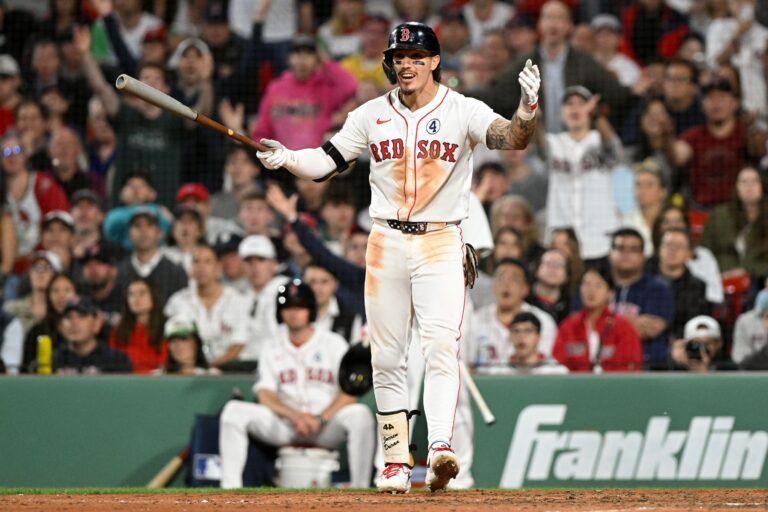 Boston Red Sox outfielder Jarren Duran (16) reacts after striking out against the Los Angeles Angels during the eighth inning at Fenway Park.