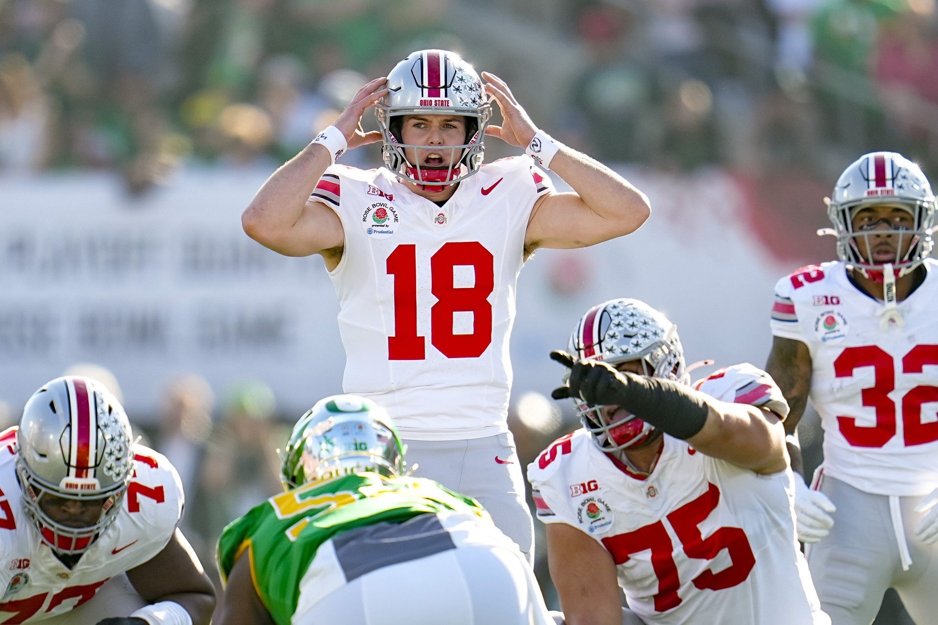 Ohio State Buckeyes quarterback Will Howard (18) motions at the line of scrimmage during the College Football Playoff quarterfinal against the Oregon Ducks at the Rose Bowl in Pasadena, Calif. on Jan. 1, 2025. Ohio State won 41-21.