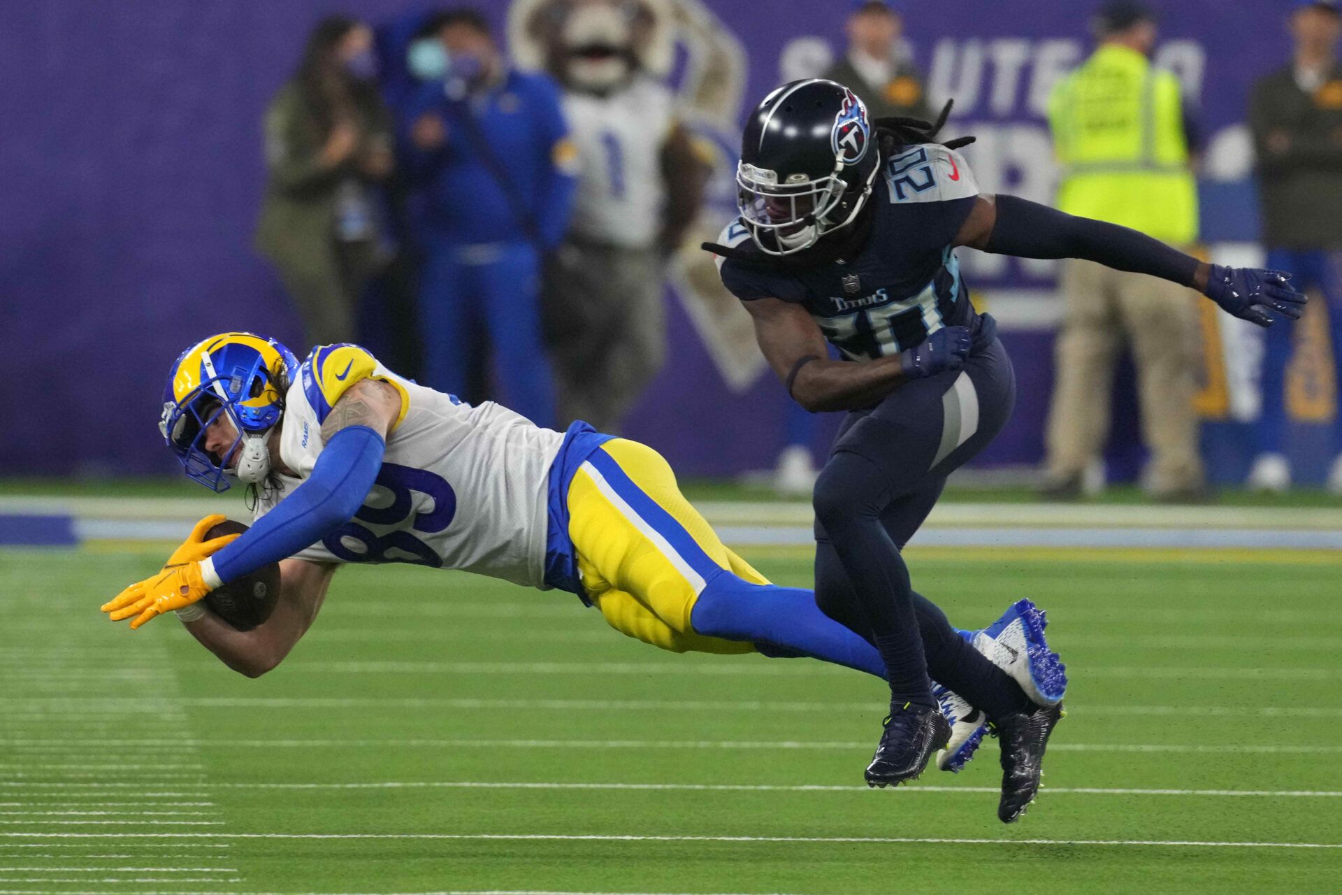 Los Angeles Rams tight end Tyler Higbee (89) is defended by Tennessee Titans cornerback Janoris Jenkins (20) in the second half at SoFi Stadium.