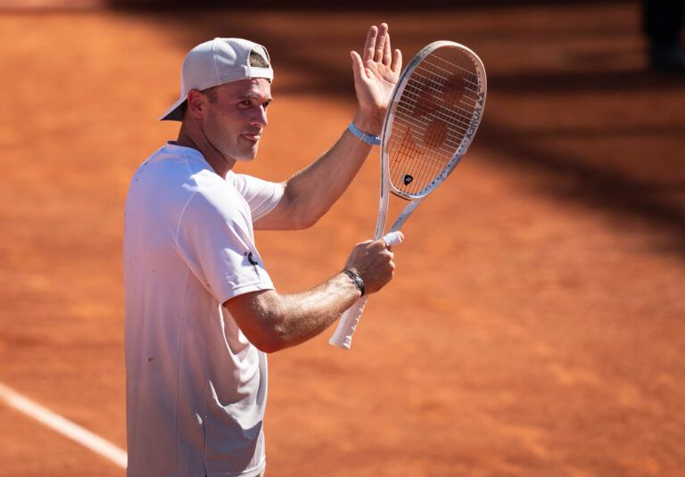 Tommy Paul of the United States celebrates winning his match against Karen Khachanov on day six at Roland Garros Stadium.