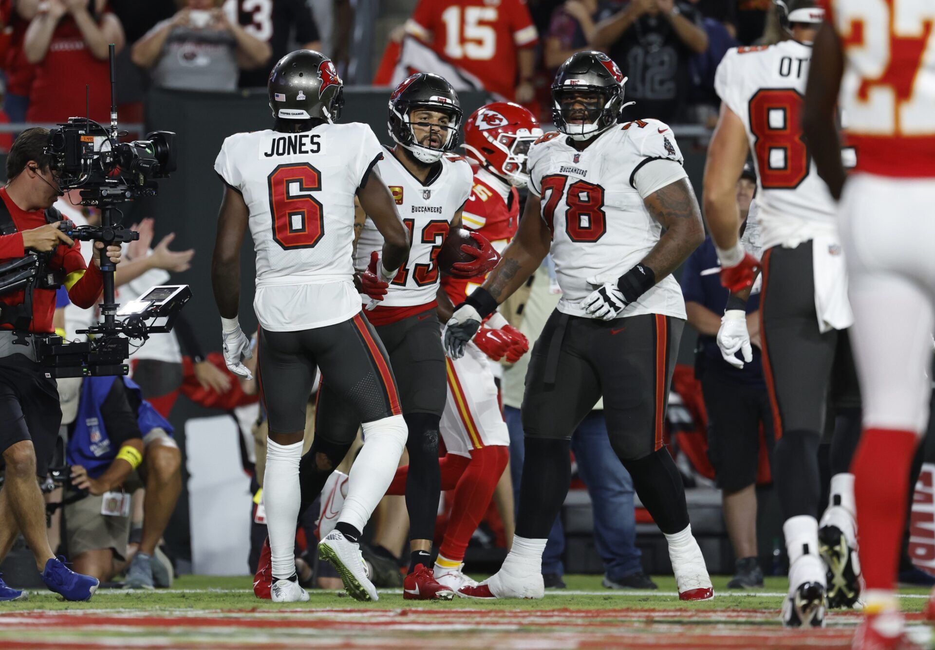 Tampa Bay Buccaneers wide receiver Mike Evans (13) is congratulated by wide receiver Julio Jones (6) after he scores a touchdown  against the Kansas City Chiefs during the first half at Raymond James Stadium.