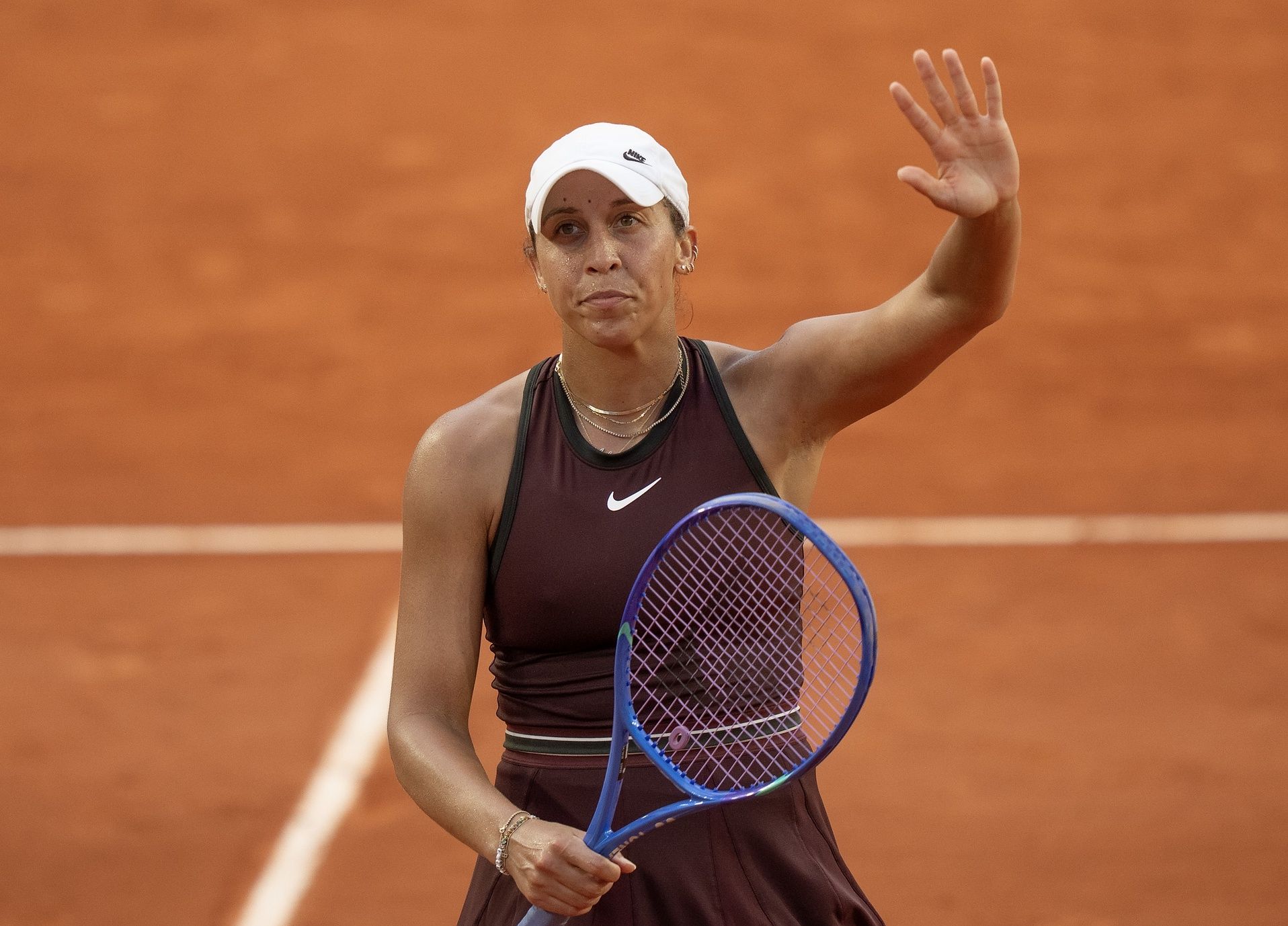 Madison Keys of the United States celebrates winning her match against Sofia Kenin of the United States on day seven at Roland Garros Stadium.