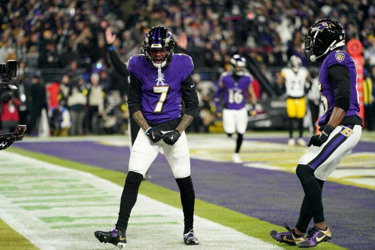 Baltimore Ravens wide receiver Rashod Bateman (7) celebrates after scoring a touchdown against the Pittsburgh Steelers in the first quarter in an AFC wild card game at M&T Bank Stadium.