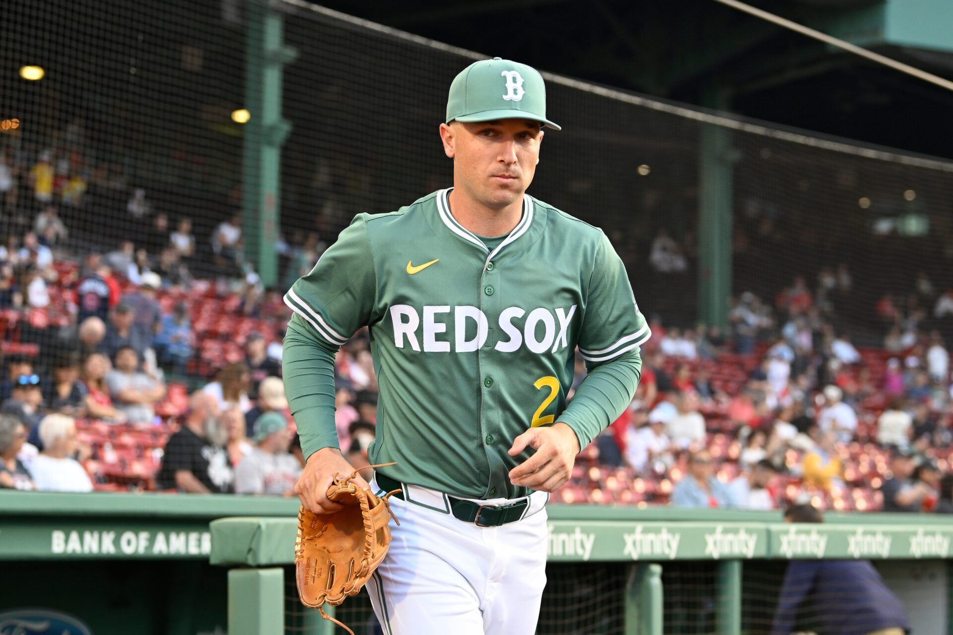 Boston Red Sox third baseman Alex Bregman (2) runs out of the dugout before the start of a game against the Atlanta Braves at Fenway Park.