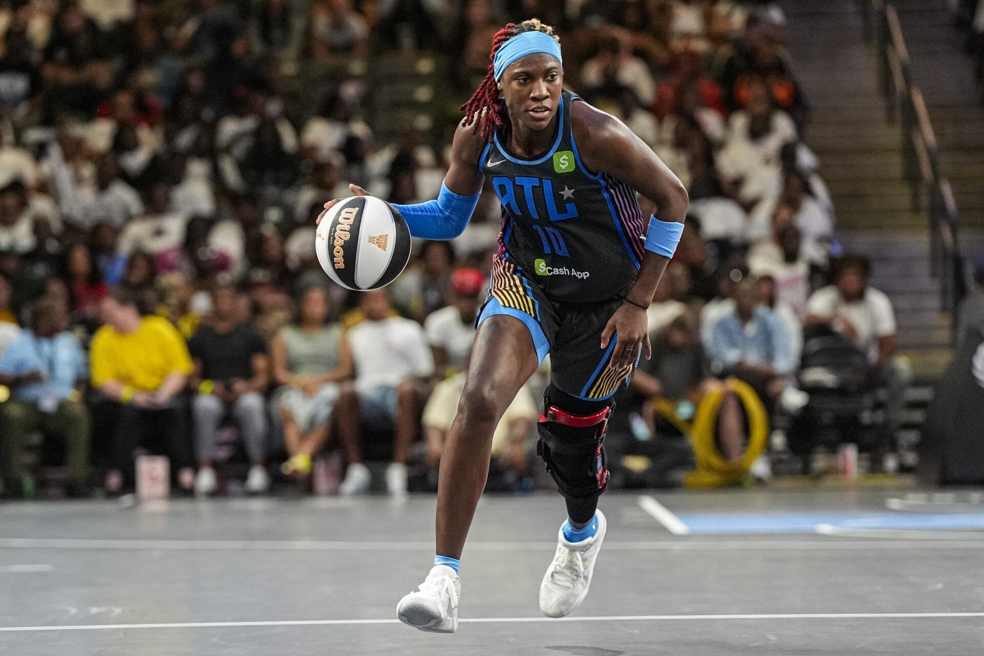 Atlanta Dream guard Rhyne Howard (10) controls the ball against the Chicago Sky during the second half at Gateway Center Arena at College Park.
