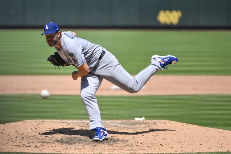 Los Angeles Dodgers starting pitcher Clayton Kershaw (22) pitches against the St. Louis Cardinals during the fifth inning at Busch Stadium.