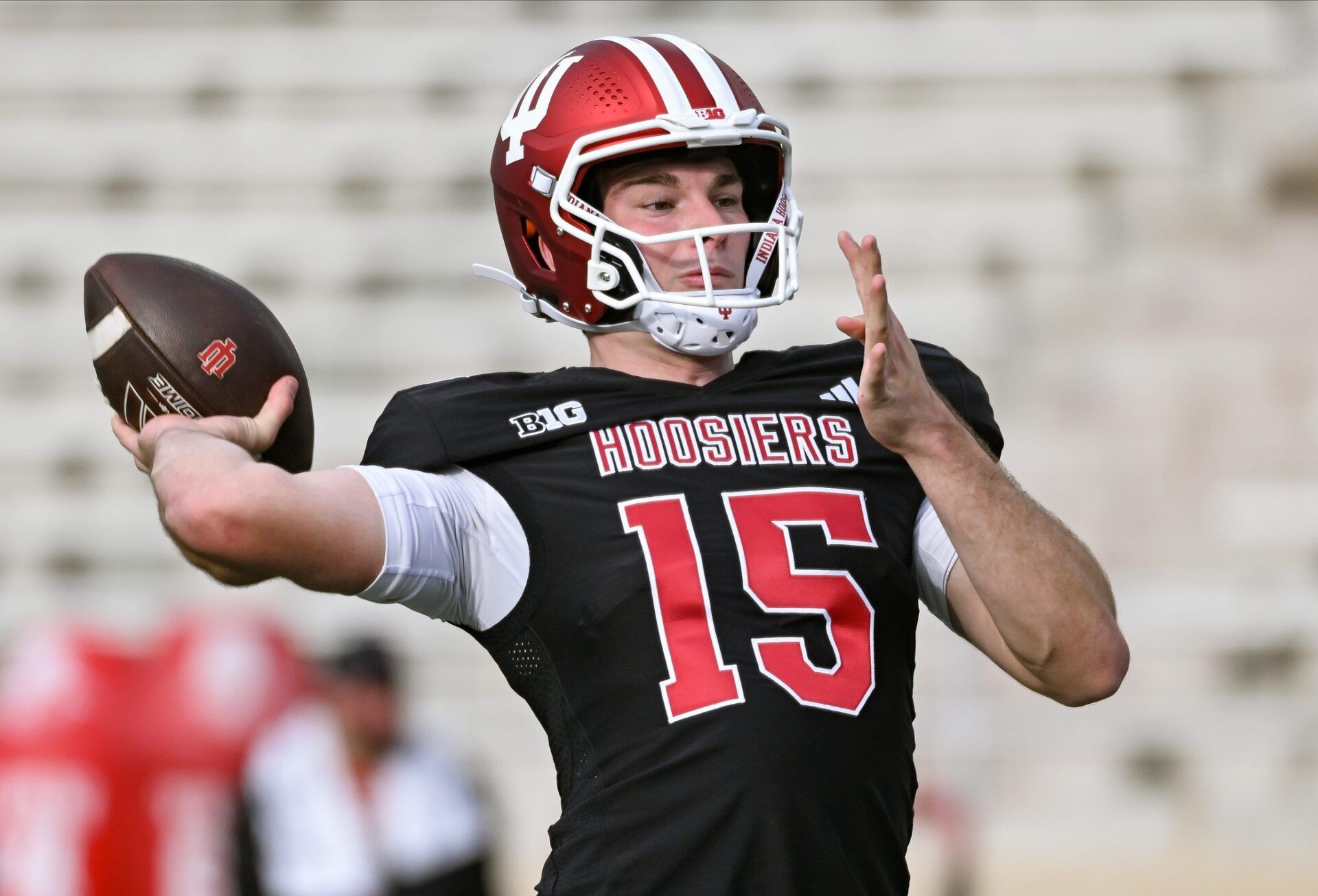 Indiana’s Fernando Mendoza (15) throws a pass during spring practice at Memorial Stadium on Thursday, April 3, 2025.