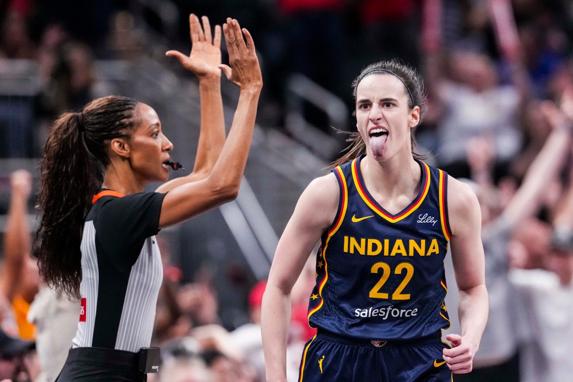 Indiana Fever guard Caitlin Clark (22) celebrates after scoring a 3-pointer Saturday, June 14, 2025, during a game between the Indiana Fever and the New York Liberty at Gainbridge Fieldhouse in Indianapolis.