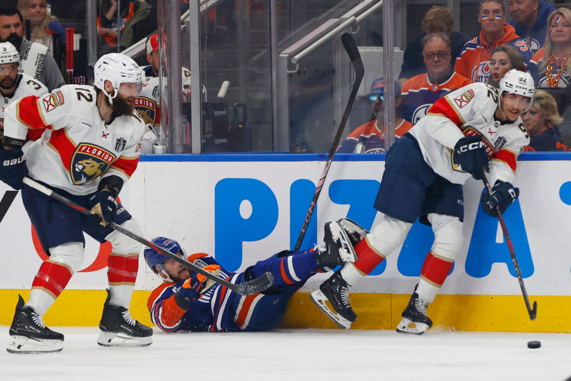foward Tomas Nosek (92) controls the puck  against Edmonton Oilers left wing Viktor Arvidsson (33) during the first period in game five of the 2025 Stanley Cup Final at Rogers Place.