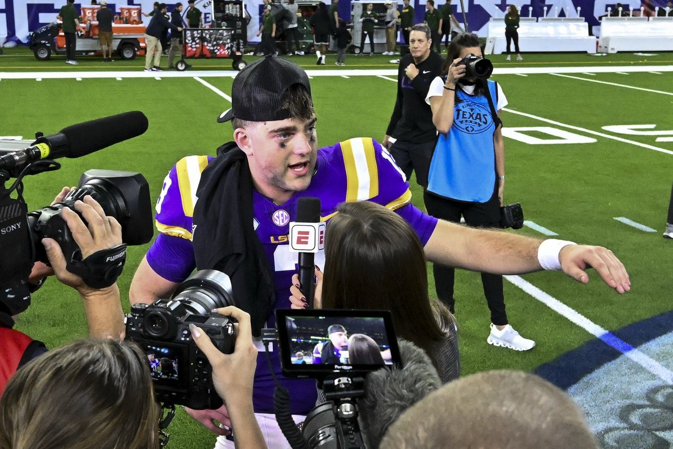 LSU Tigers quarterback Garrett Nussmeier (13) speaks during a post game interview at NRG Stadium. The Tigers defeat the Bears 44-31.
