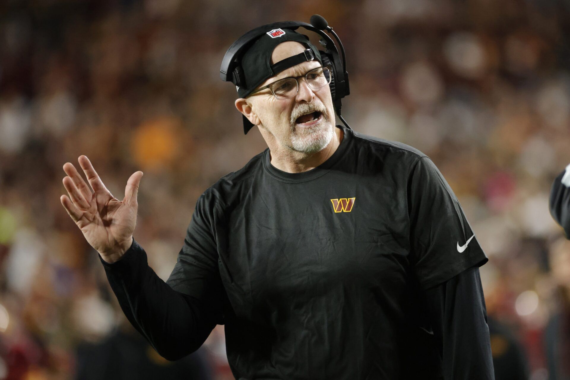Washington Commanders head coach Dan Quinn reacts from the sidelines against the Atlanta Falcons during the second half at Northwest Stadium.