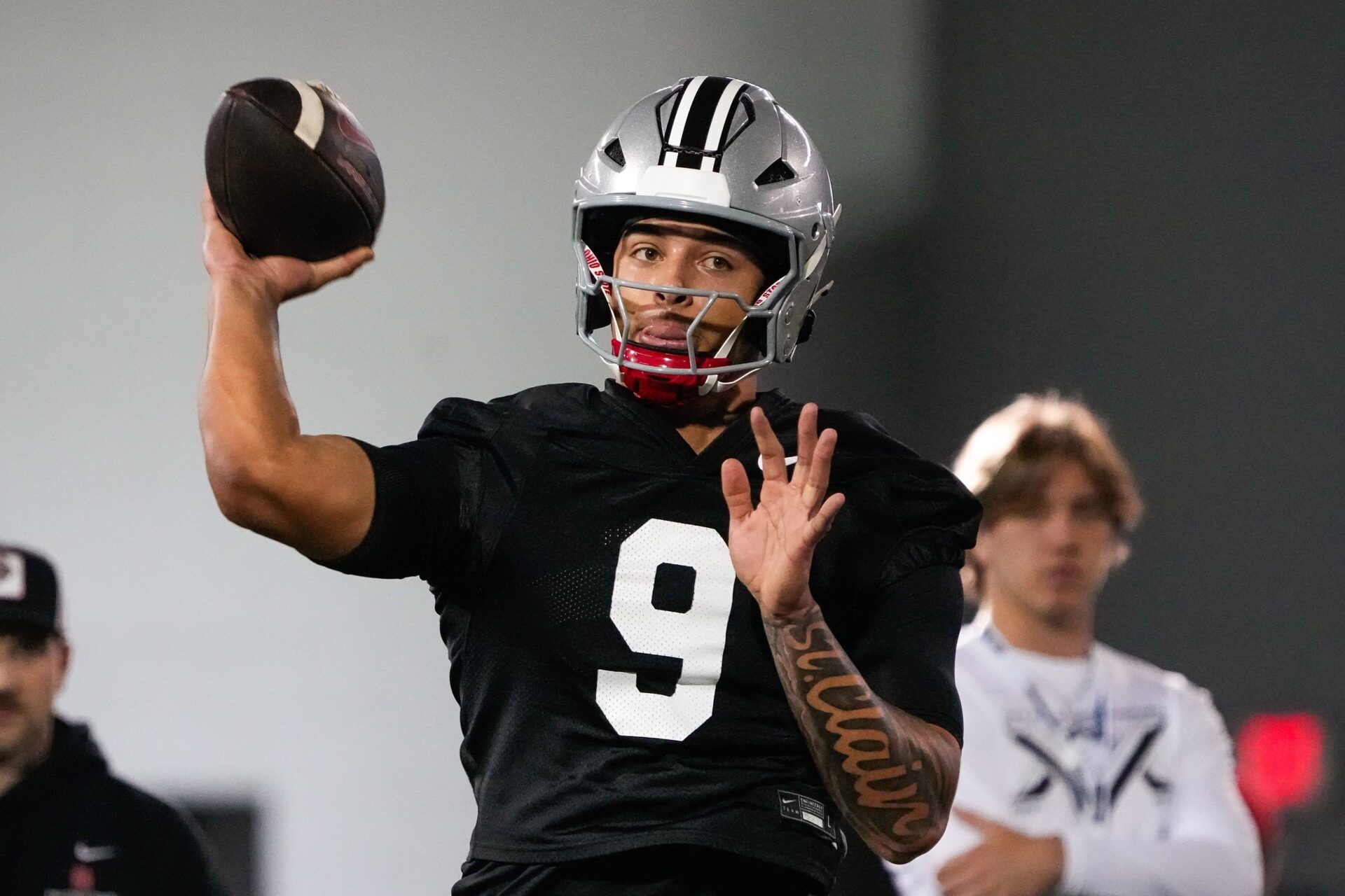 Ohio State Buckeyes quarterback Tavien St. Clair (9) makes a pass during spring football practice at the Woody Hayes Athletic Center on Wednesday, March 19, 2025 in Columbus, Ohio.