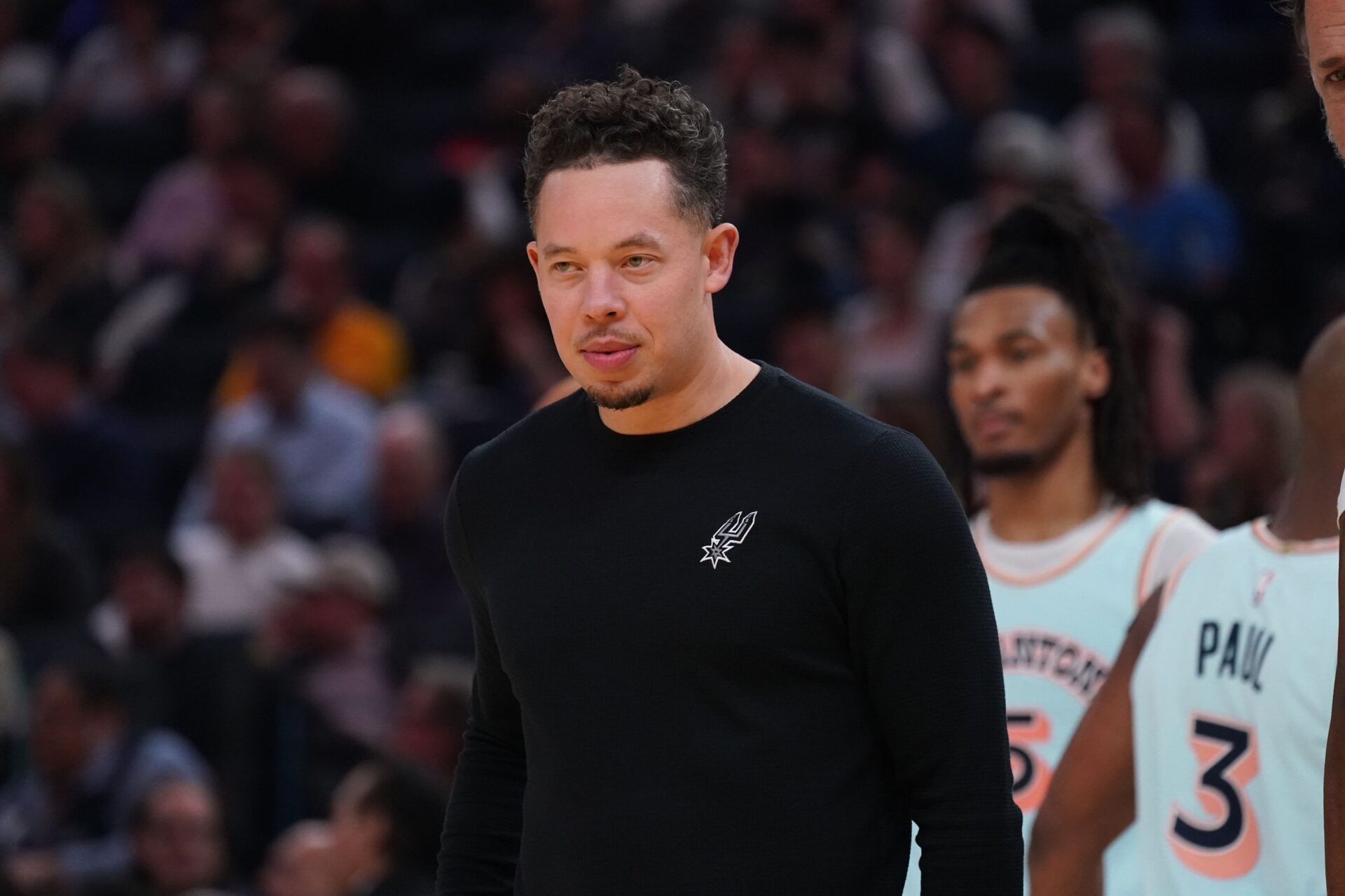 San Antonio Spurs interim head coach Mitch Johnson watches the action against the Golden State Warriors in the second period at Chase Center.
