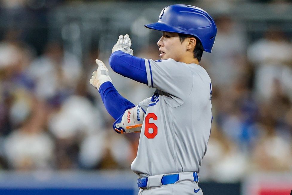 Los Angeles Dodgers center fielder Hyeseong Kim (6) celebrates after hitting a rbi double during the fifth inning against the San Diego Padres at Petco Park.