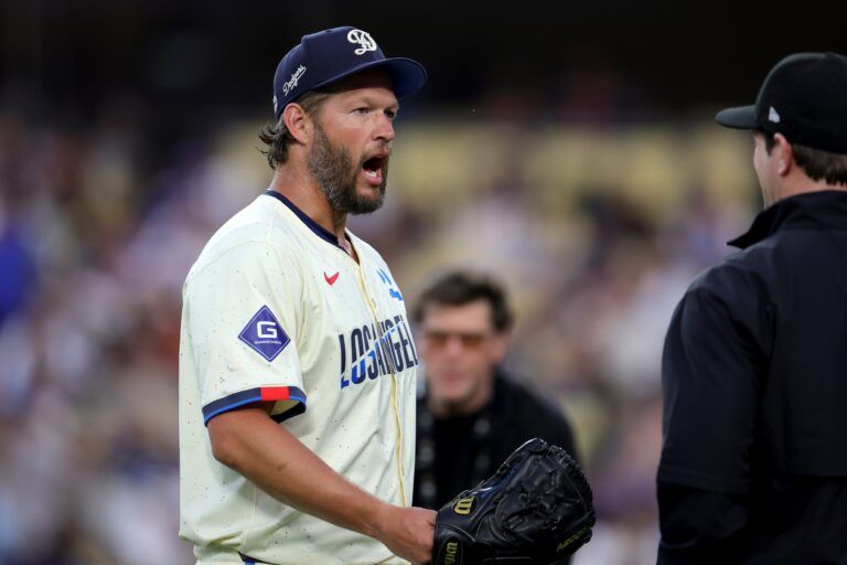 Los Angeles Dodgers pitcher Clayton Kershaw (22) reacts after walking off the mound after the third inning against the San Francisco Giants at Dodger Stadium.