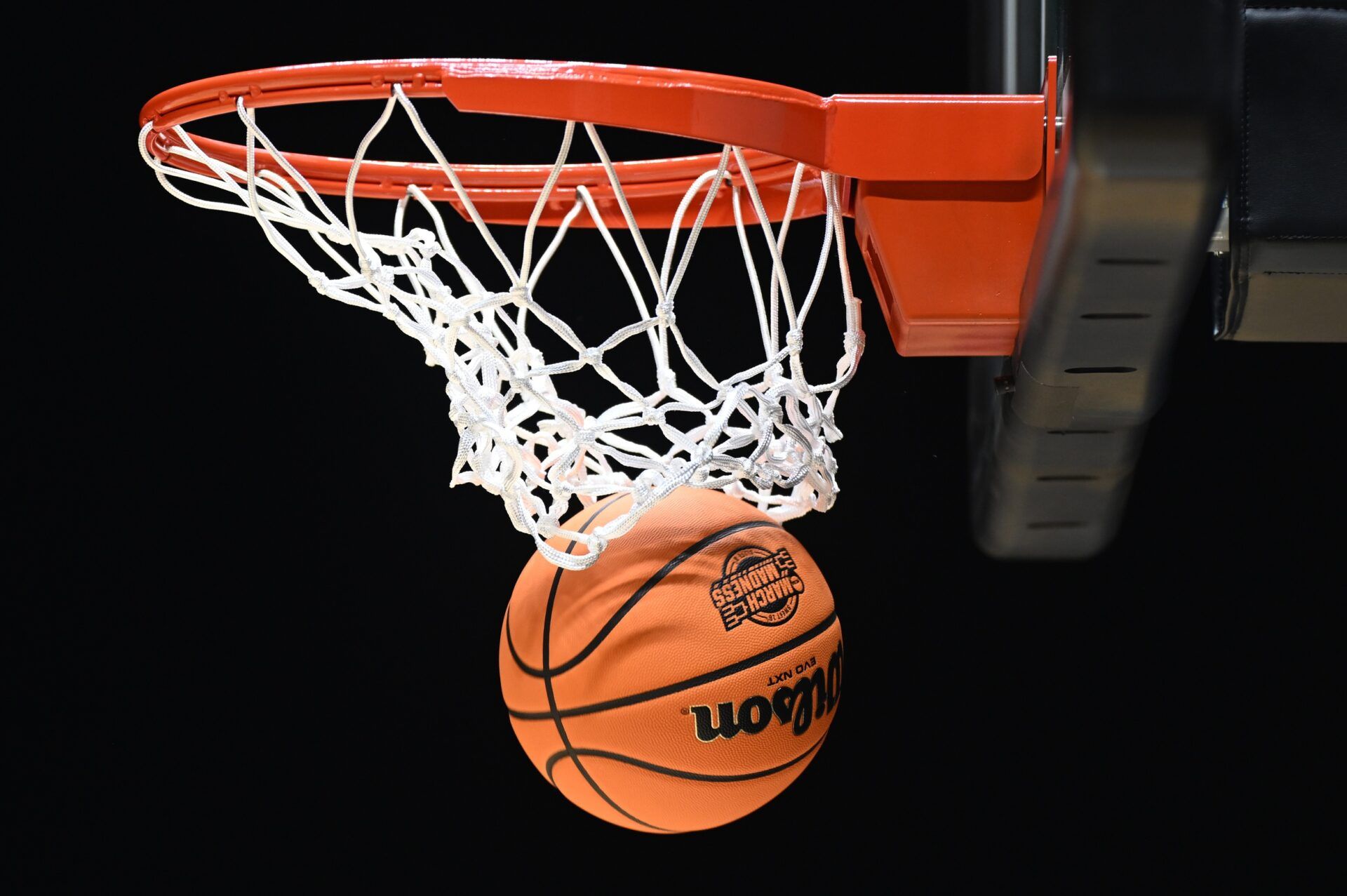 The March Madness logo is seen on a basketball during the NCAA tournament midwest regional practice day at Lucas Oil Stadium.