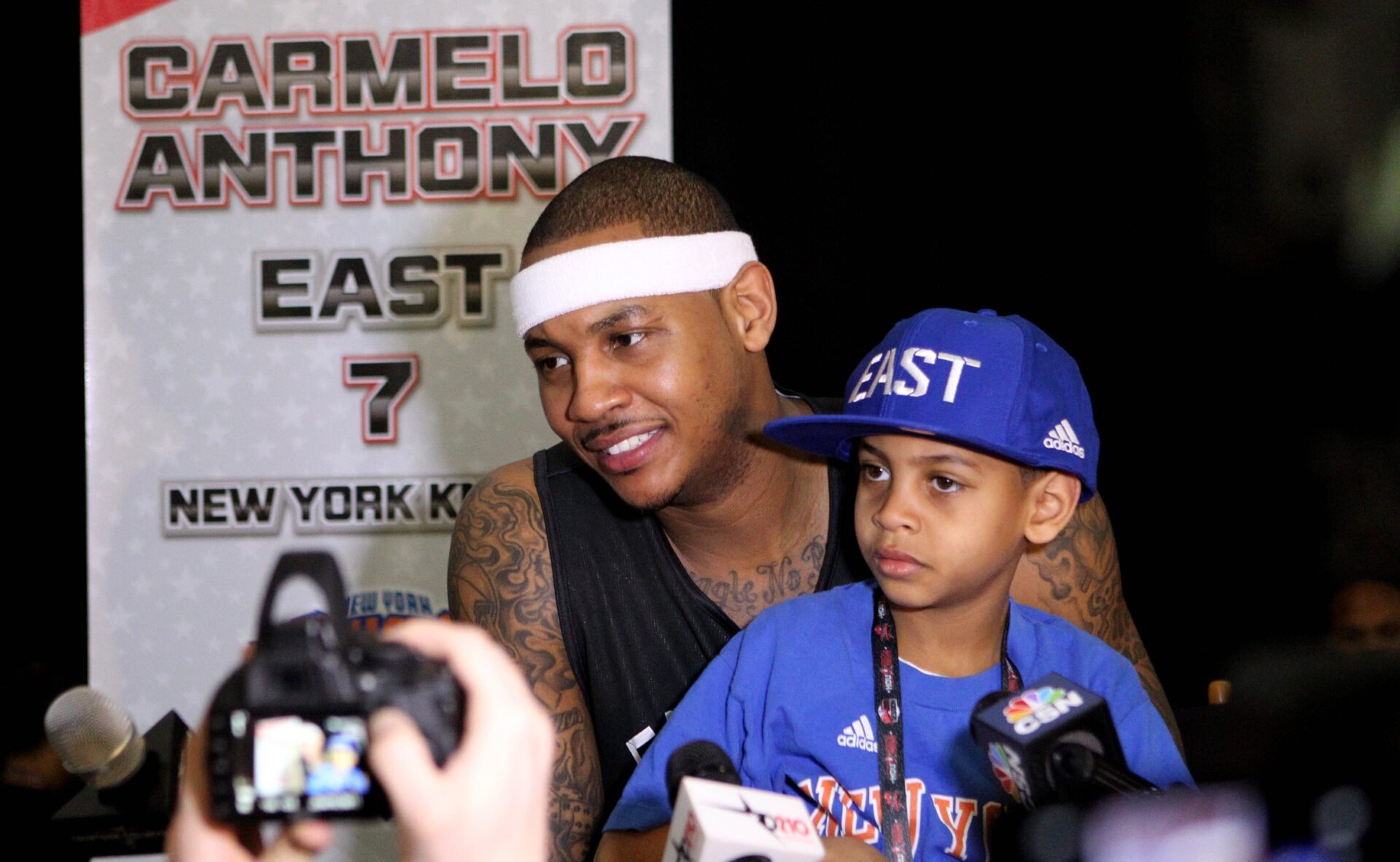 Eastern Conference forward Carmelo Anthony (7) of the New York Knicks holds his son Kiyan Carmelo Anthony during the media availability for the 2013 NBA all star game at the George R. Brown Convention Center.