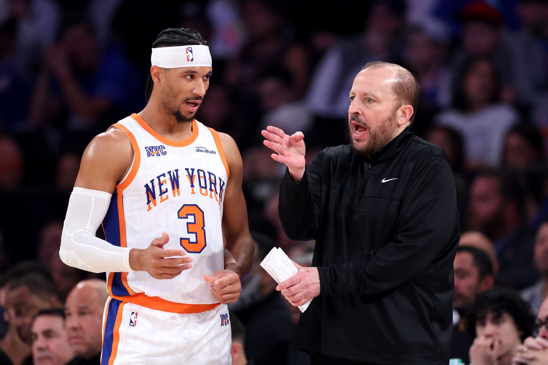 NEW YORK, NEW YORK - NOVEMBER 17: Head coach Tom Thibodeau of the New York Knicks and Josh Hart #3 confer against the Brooklyn Nets during the first half at Madison Square Garden on November 17, 2024 in New York City. NOTE TO USER: User expressly acknowledges and agrees that, by downloading and or using this photograph, User is consenting to the terms and conditions of the Getty Images License Agreement.  (Photo by Luke Hales/Getty Images)