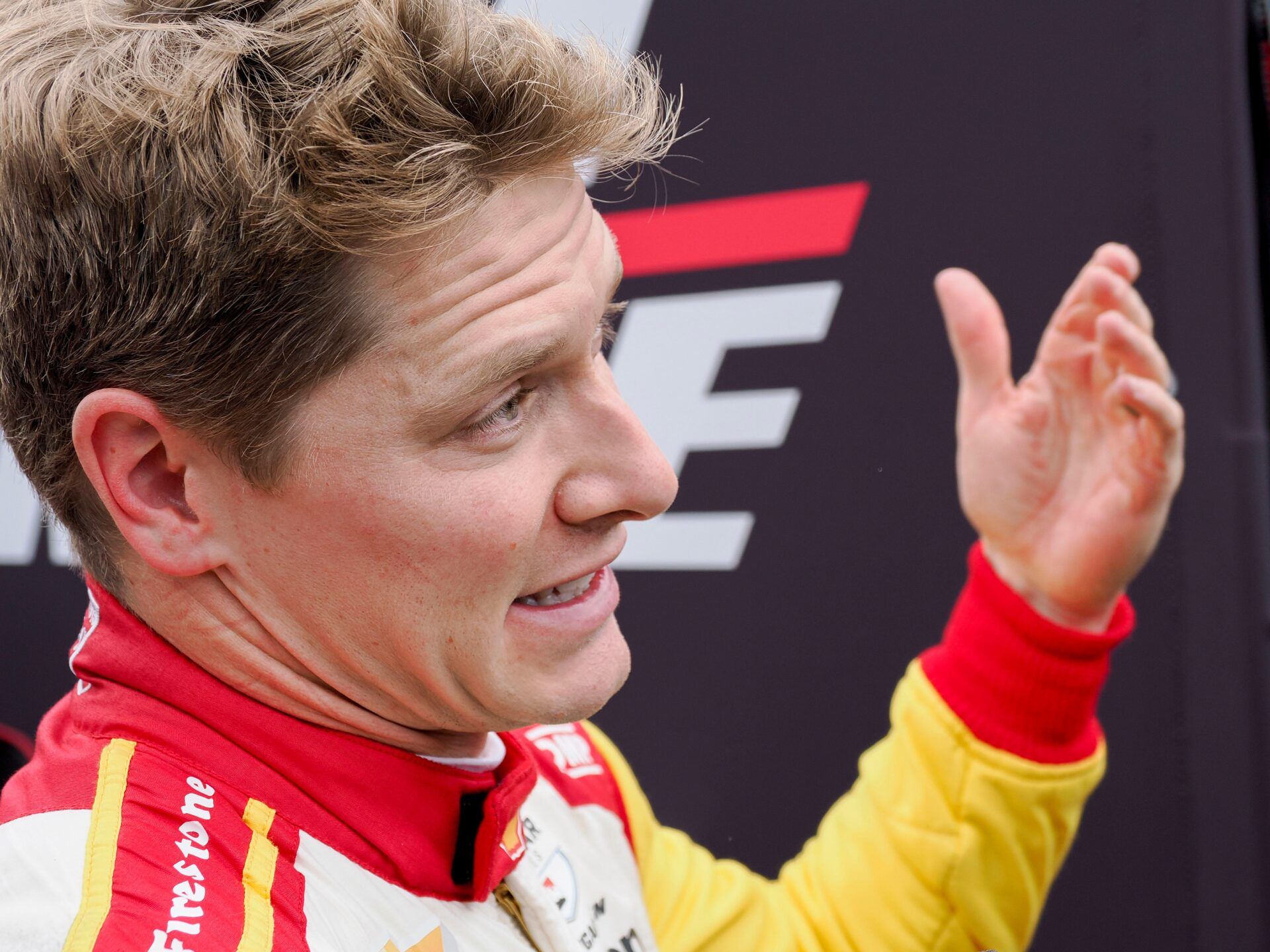 Team Penske driver Josef Newgarden (2) talks by his pit box following a car malfunction that took him out of the race Sunday, May 25, 2025, during the 109th running of the Indianapolis 500 at Indianapolis Motor Speedway.